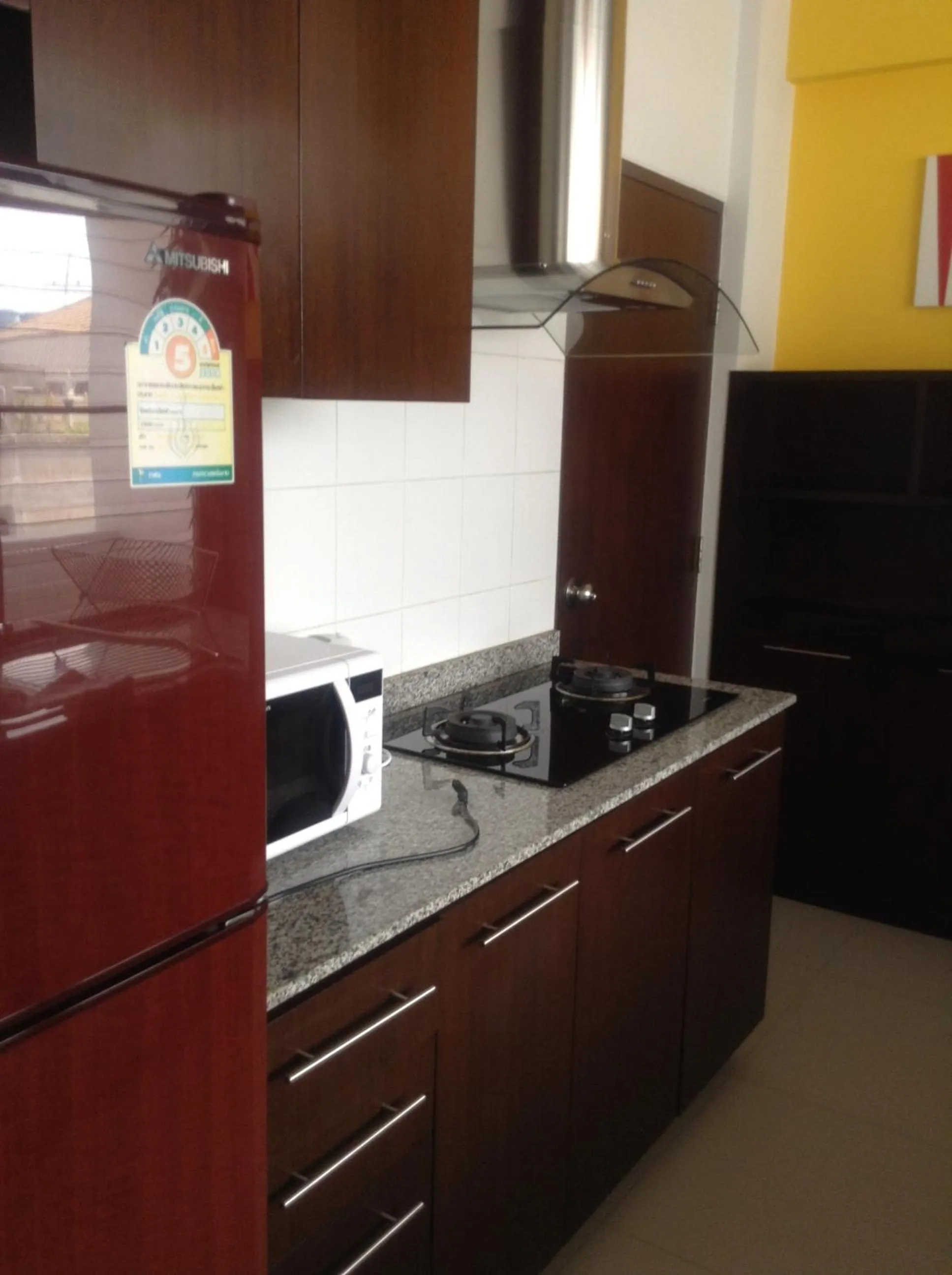 Kitchen or kitchenette in P.T. Court