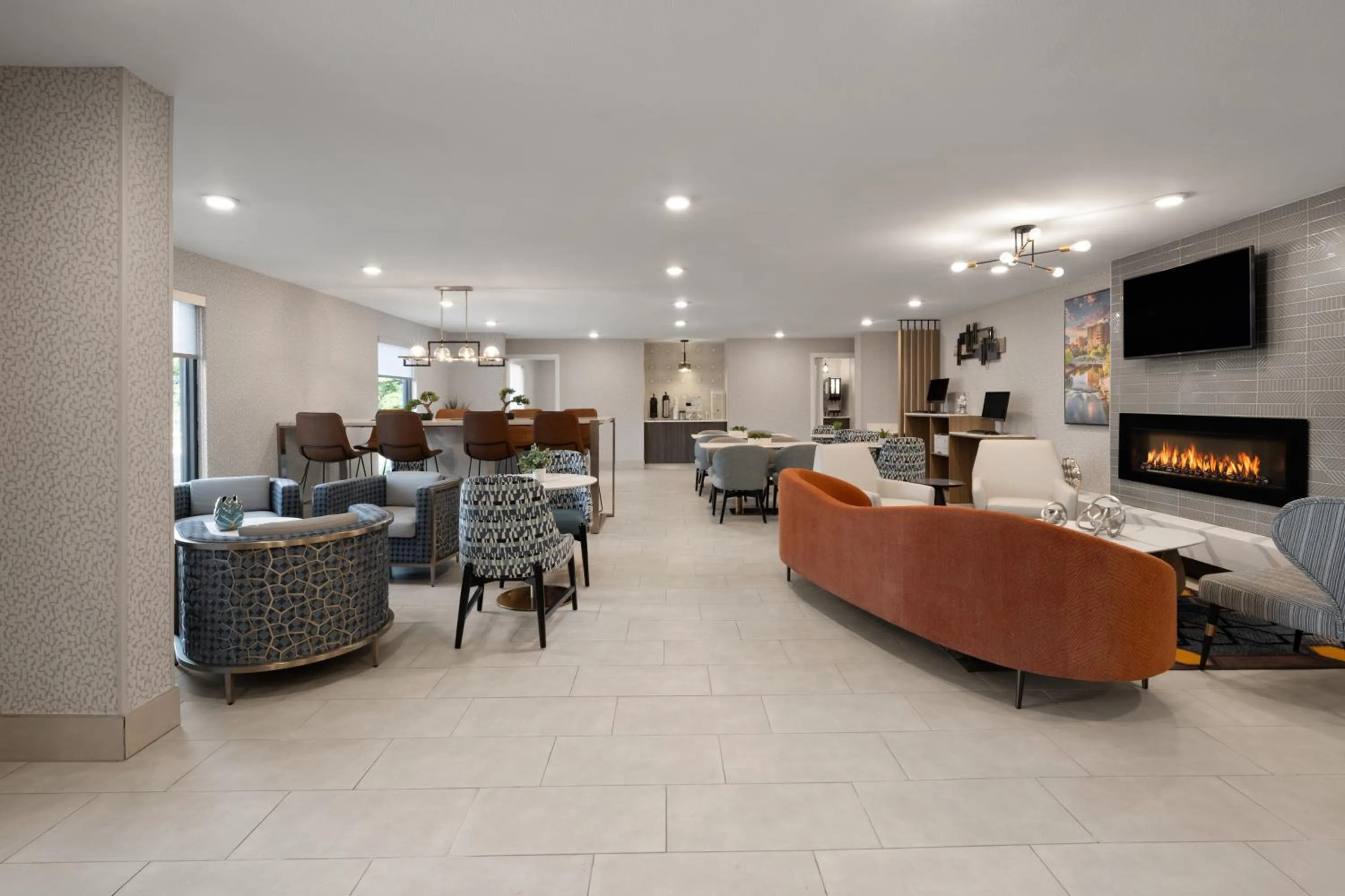 Seating area in La Quinta Inn & Suites by Wyndham Greenville Woodruff Rd