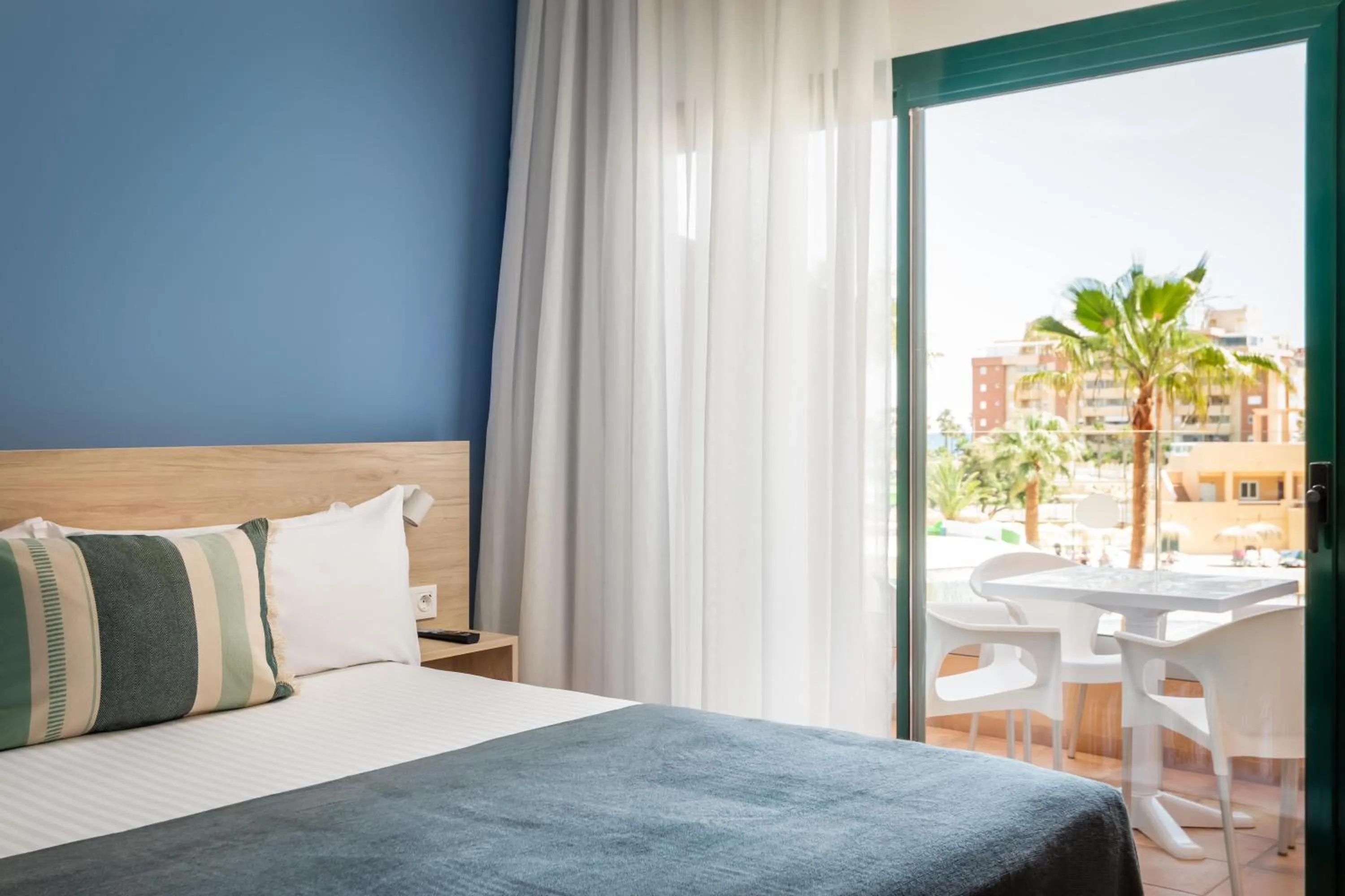 Photo of the whole room, Bed in ALEGRIA Colonial Mar Aquafun