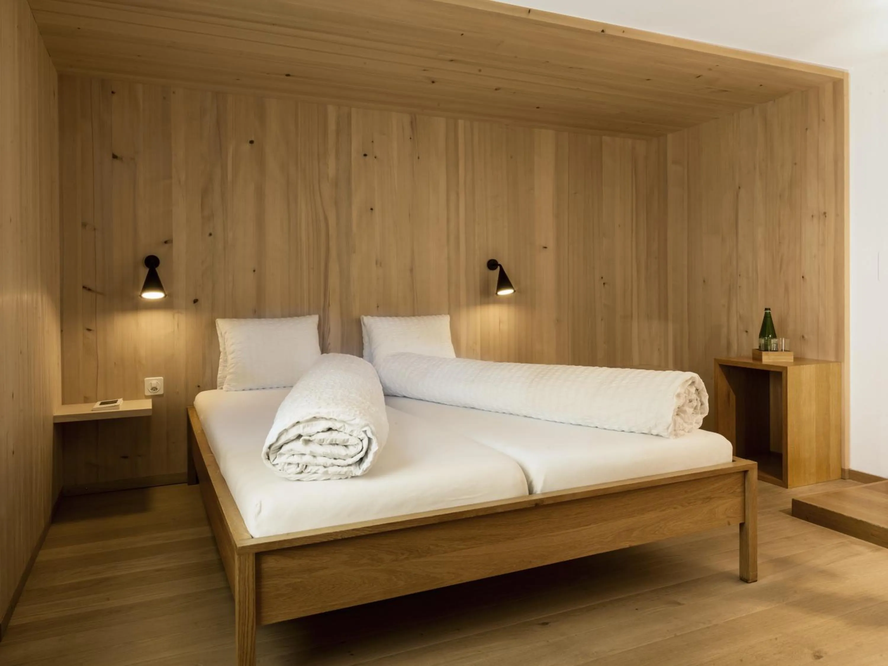 Bed in Hotel Alpina