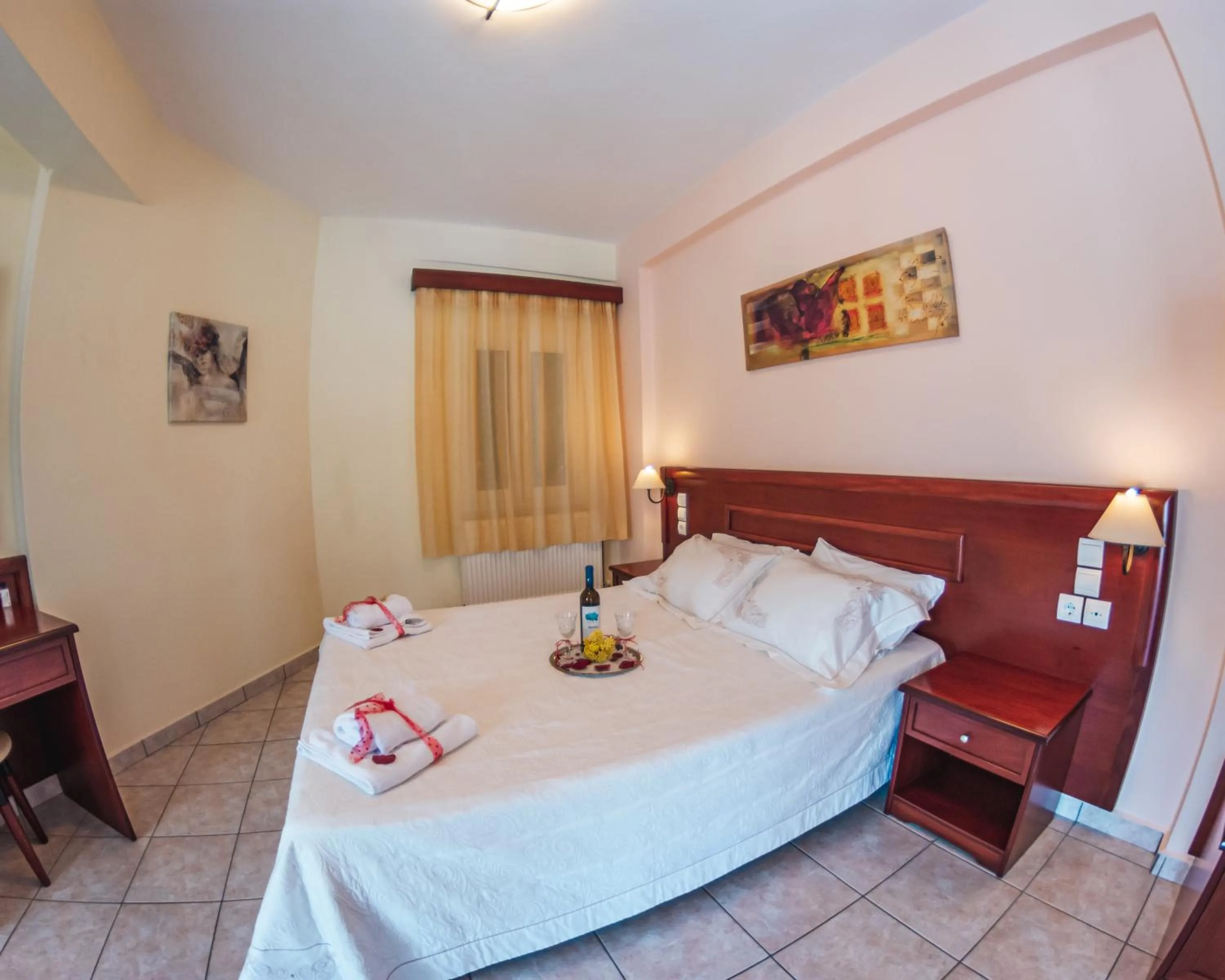 Bed in Venardos Hotel