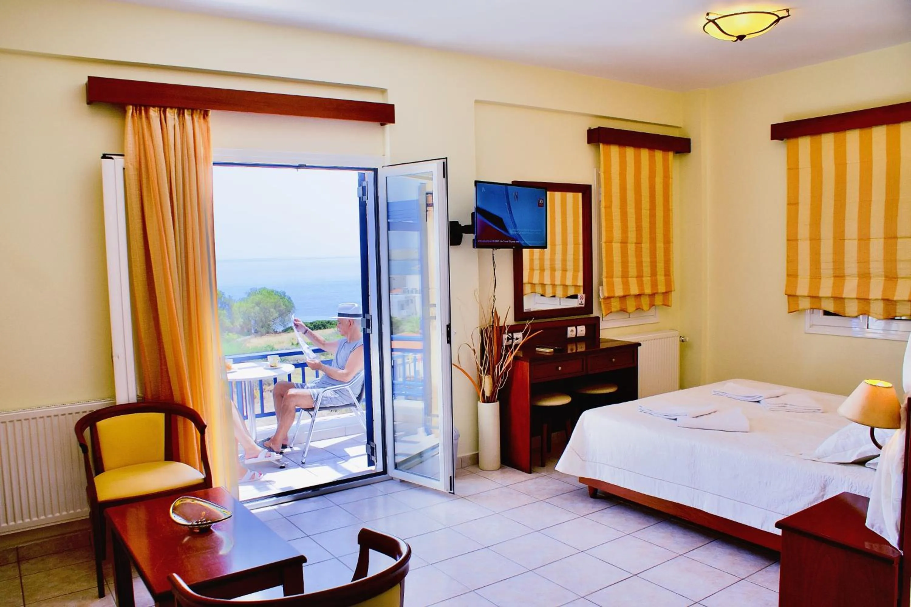 Bed in Venardos Hotel