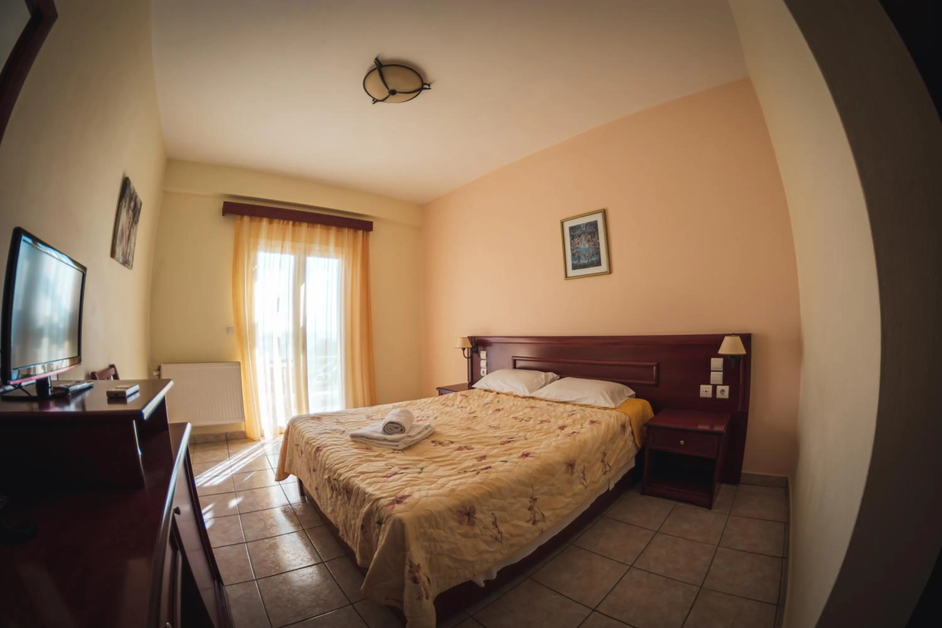 Bed in Venardos Hotel