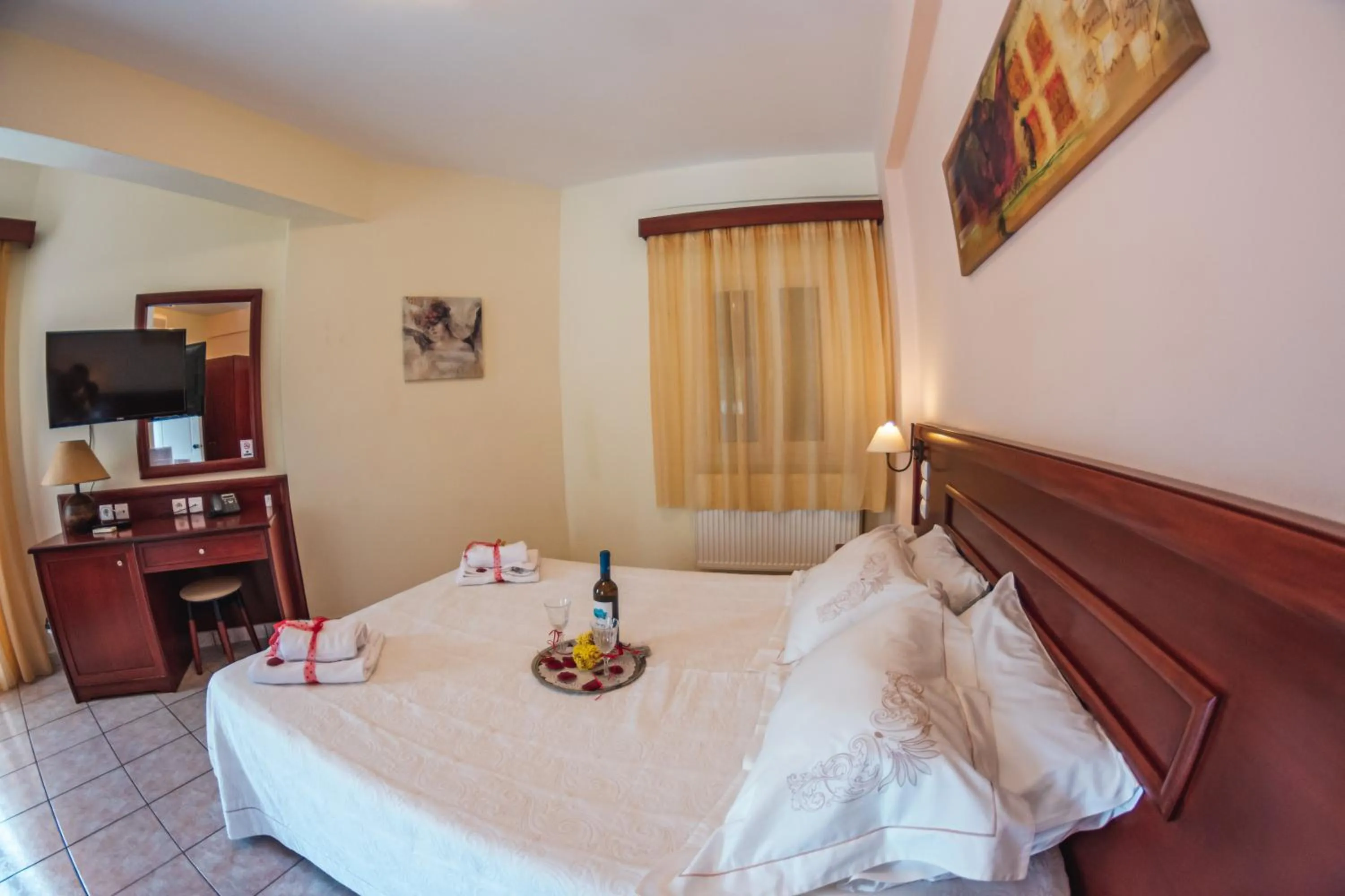 Bed in Venardos Hotel