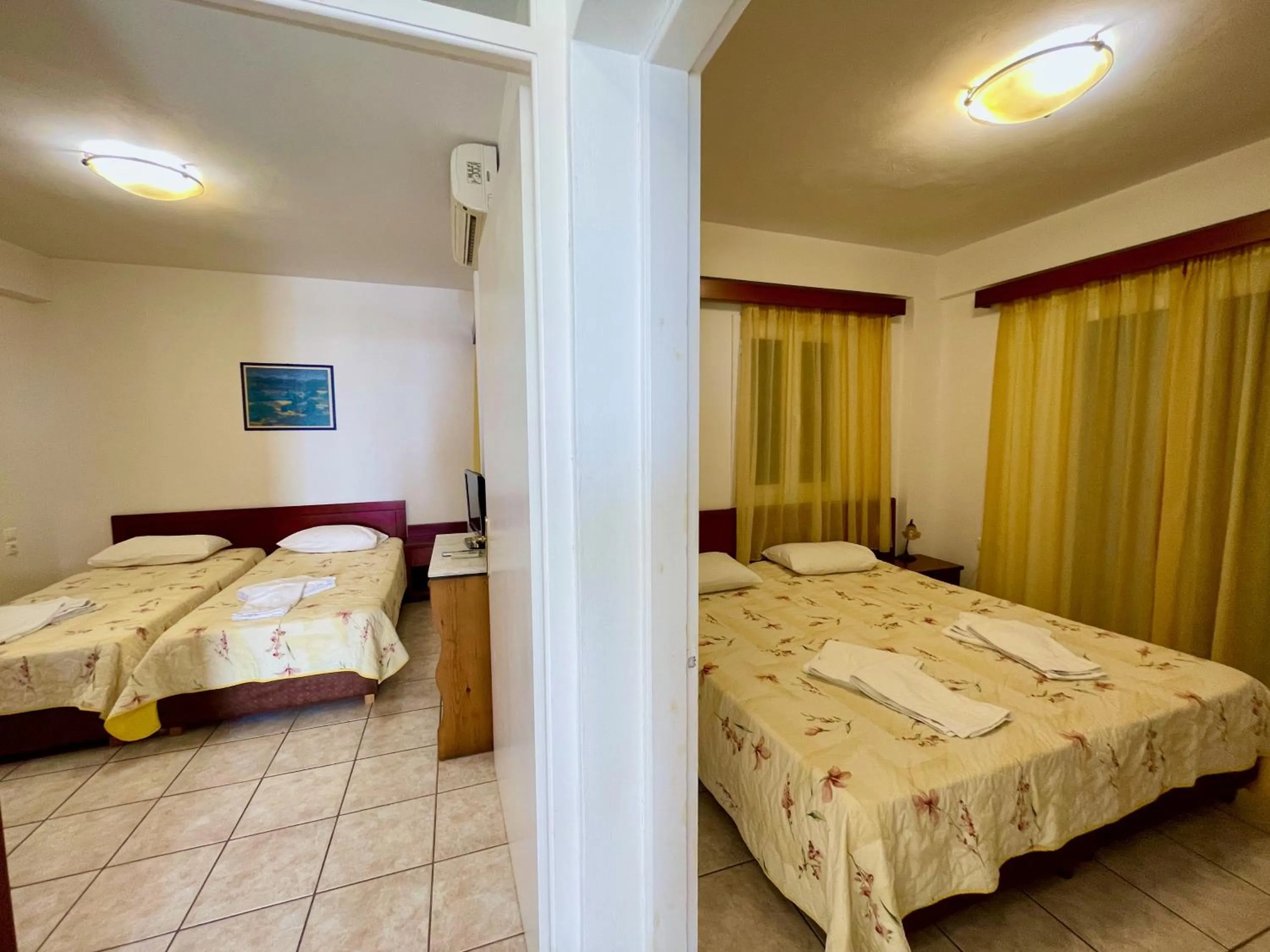 Bed in Venardos Hotel