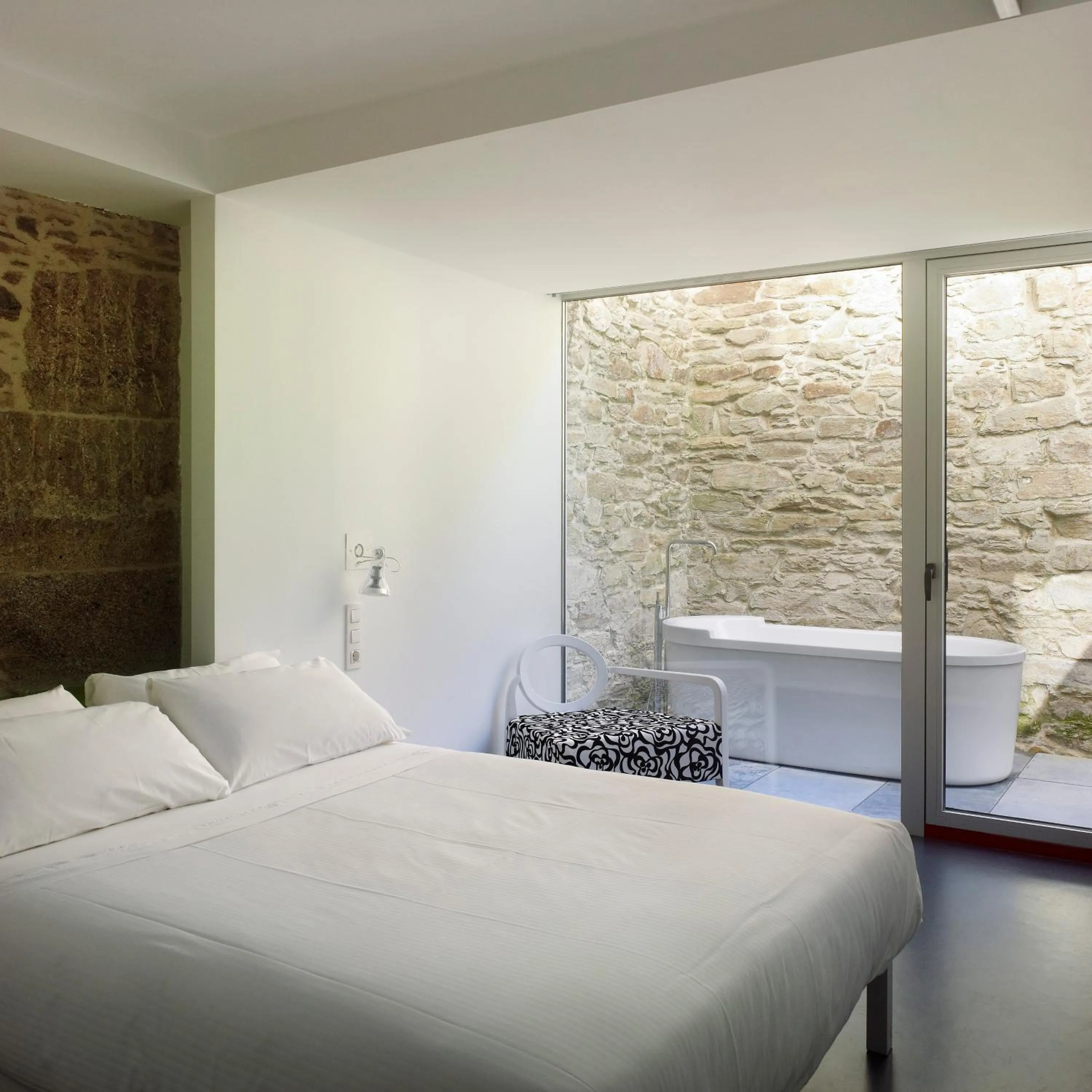 Patio, Bed in Moure Hotel