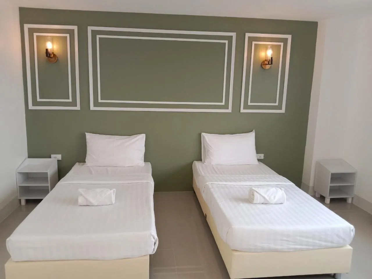 Bed in Regent Lodge Lampang