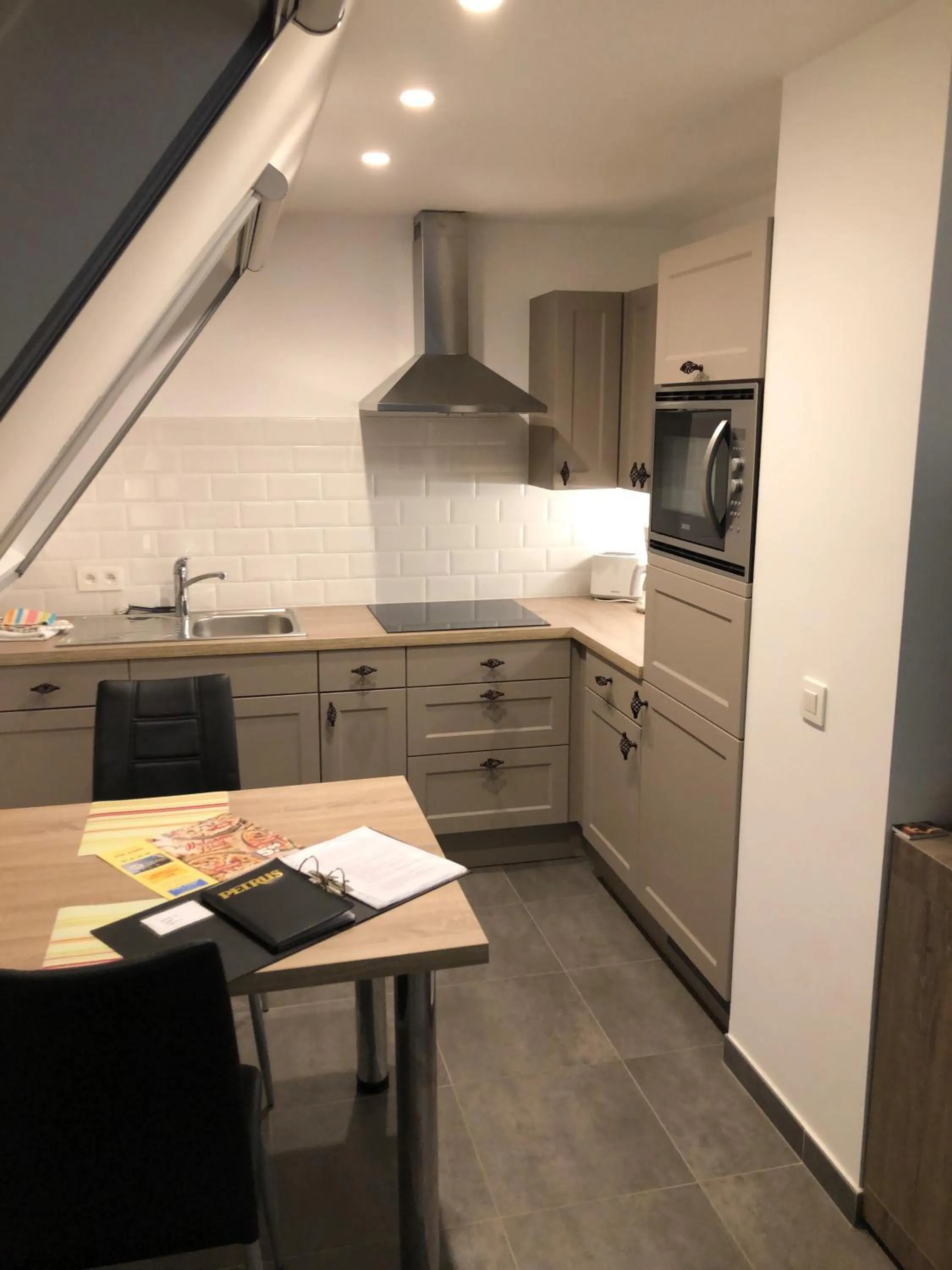 Kitchen or kitchenette in B&B wellness Sea Nat voor Naturisten