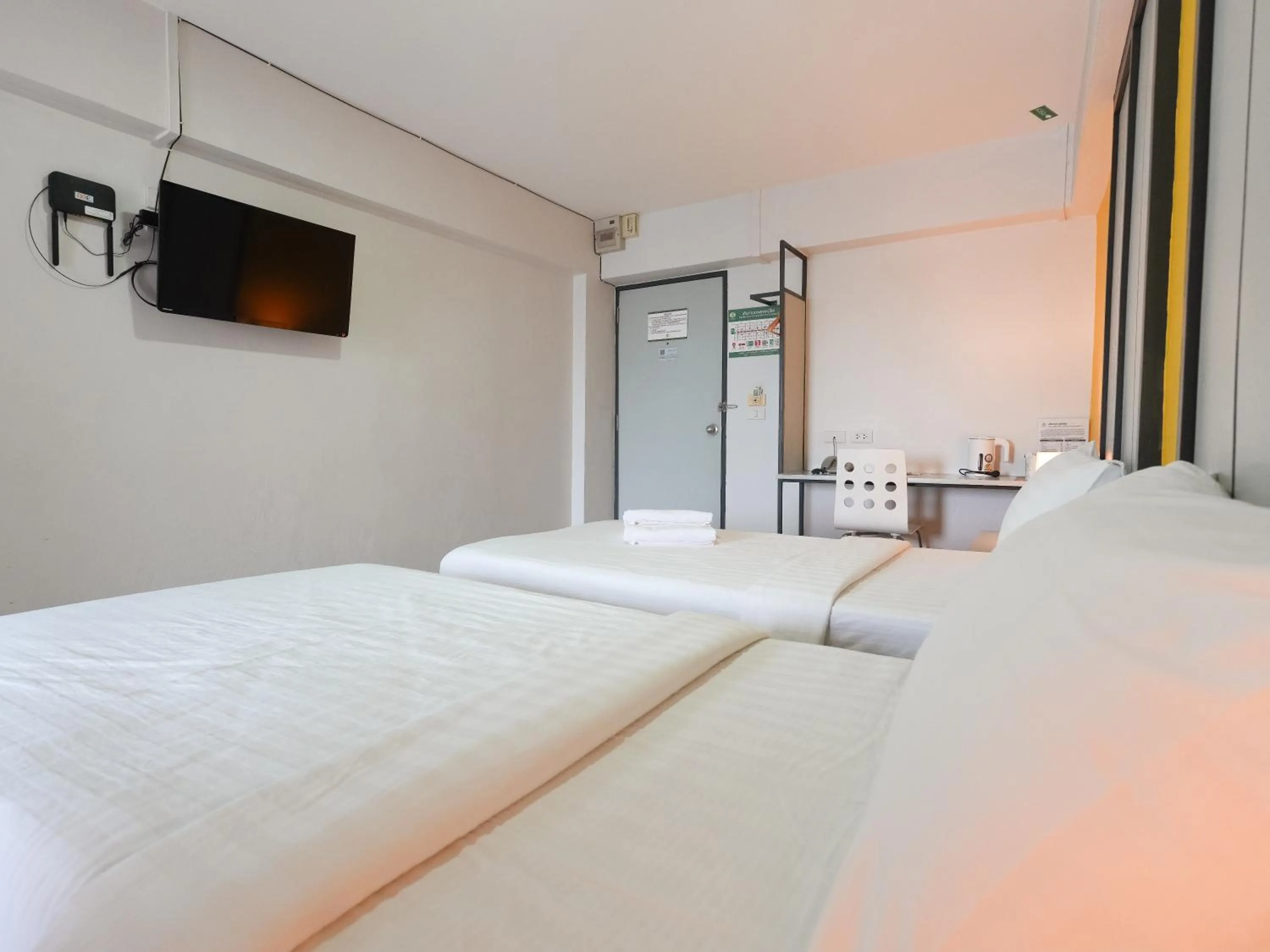 Bed in Regent Ngamwongwan Hotel