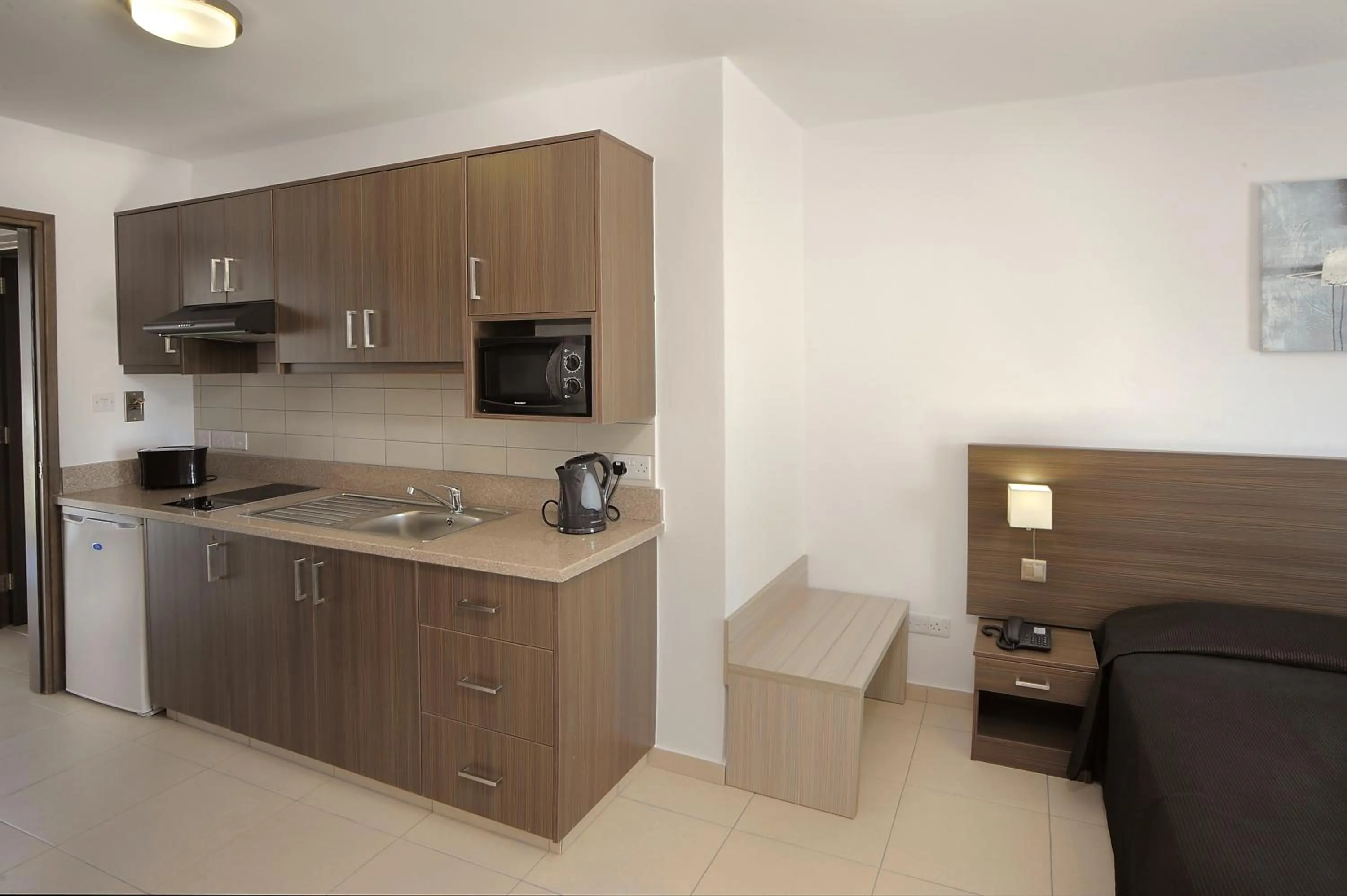 Kitchen or kitchenette in Petrosana Hotel Apartments