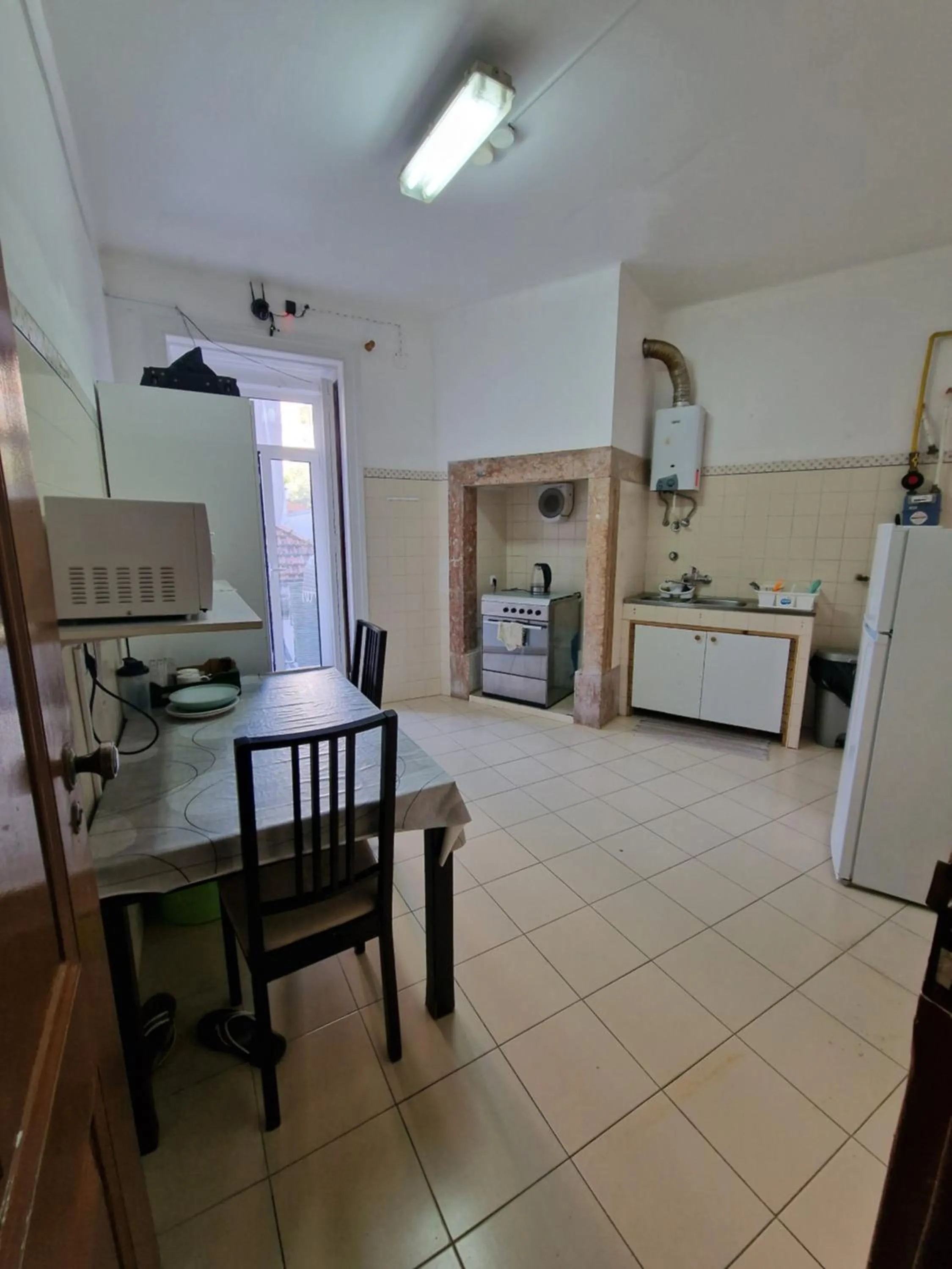 Kitchen or kitchenette in Alojamento Local Private Accommodation
