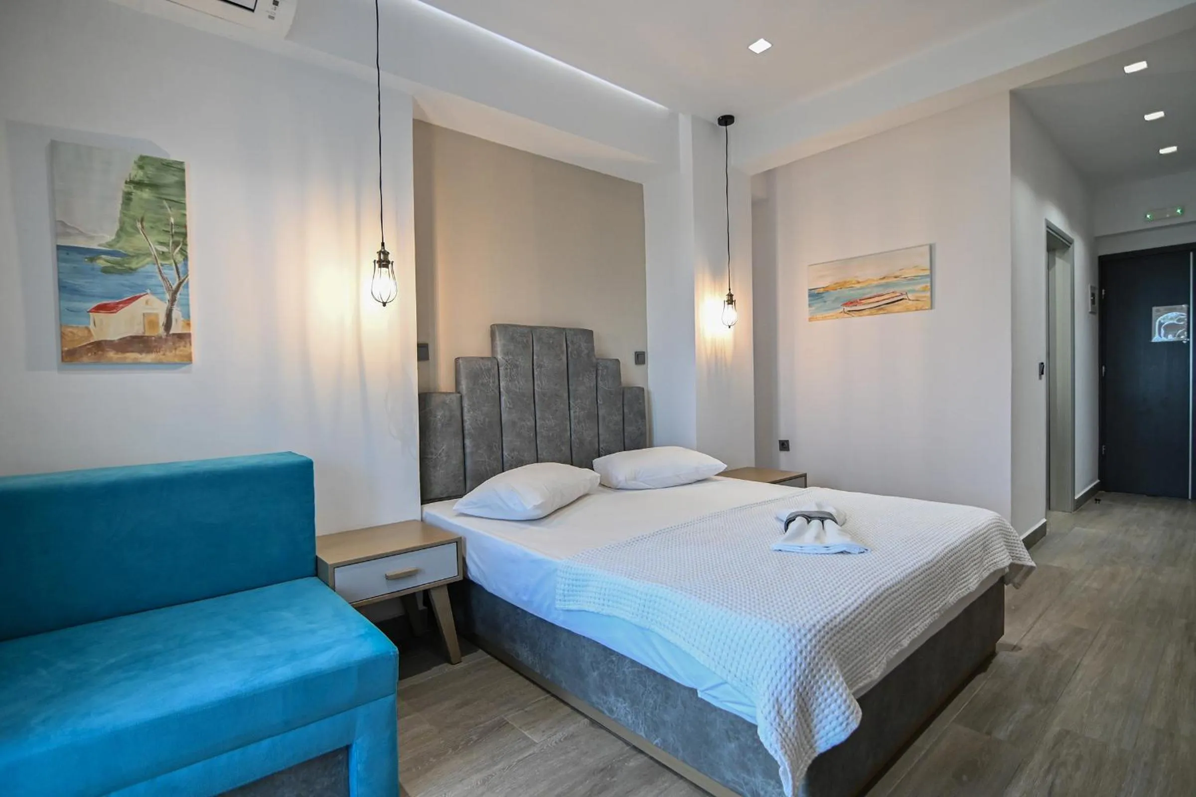 Bed in Amalia Rooms Sea View