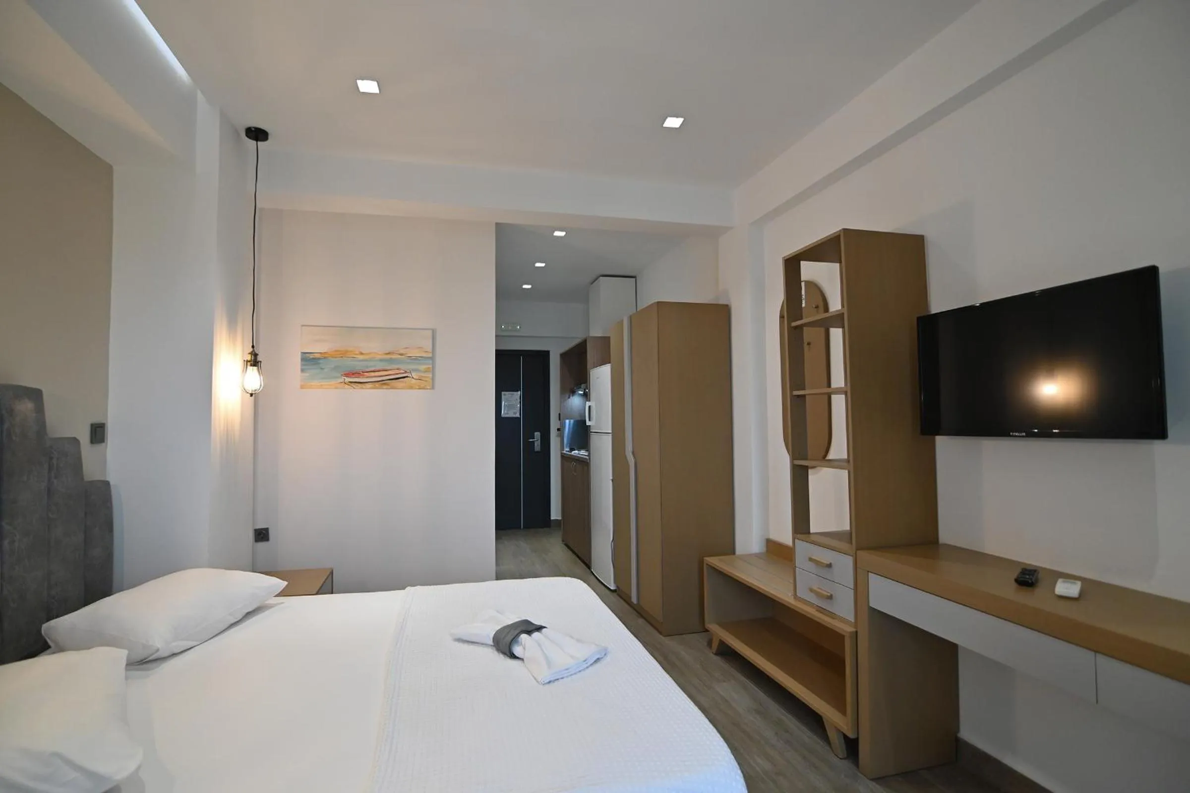 Bed in Amalia Rooms Sea View