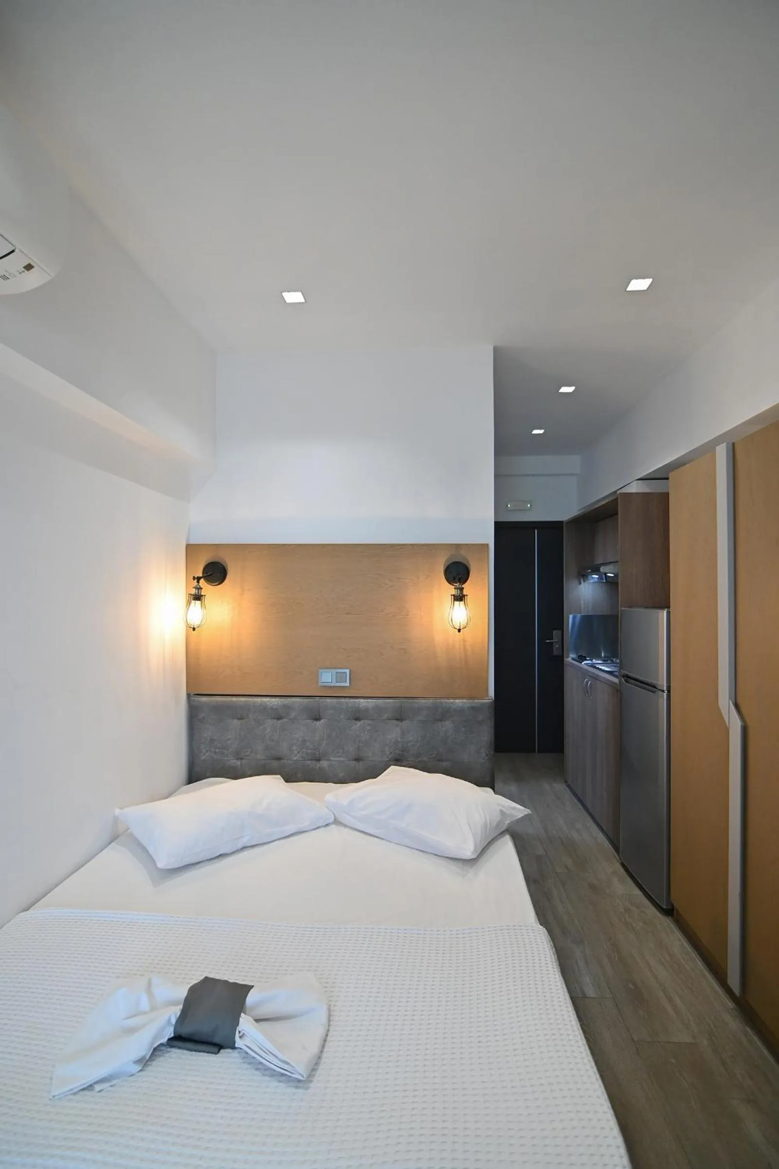 Bed in Amalia Rooms Sea View