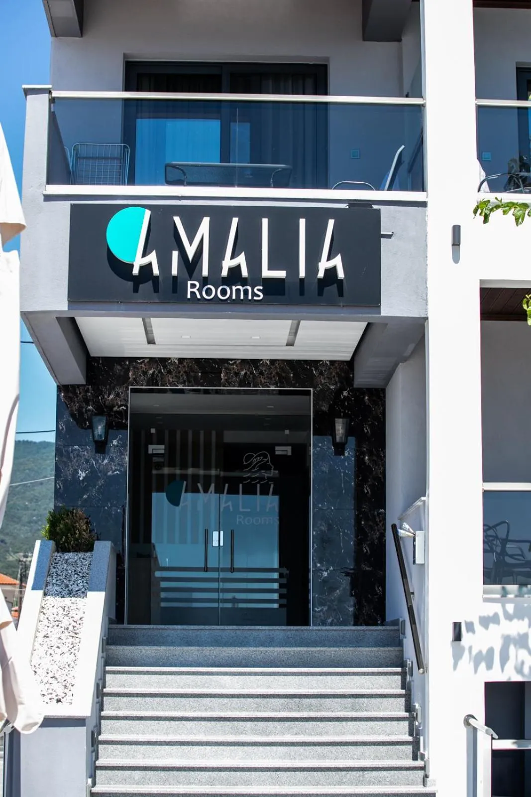 Property logo or sign in Amalia Rooms Sea View