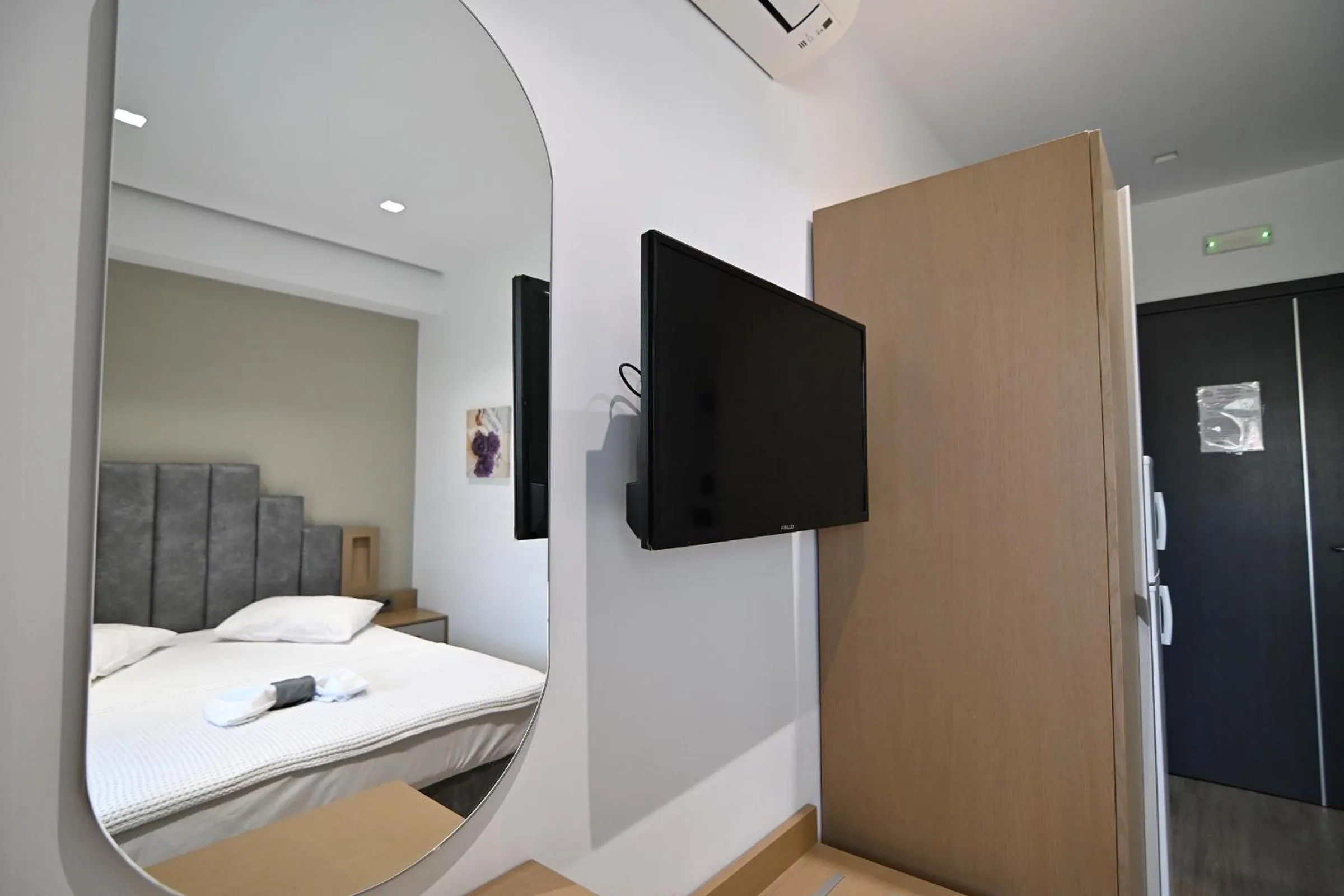 Bed in Amalia Rooms Sea View