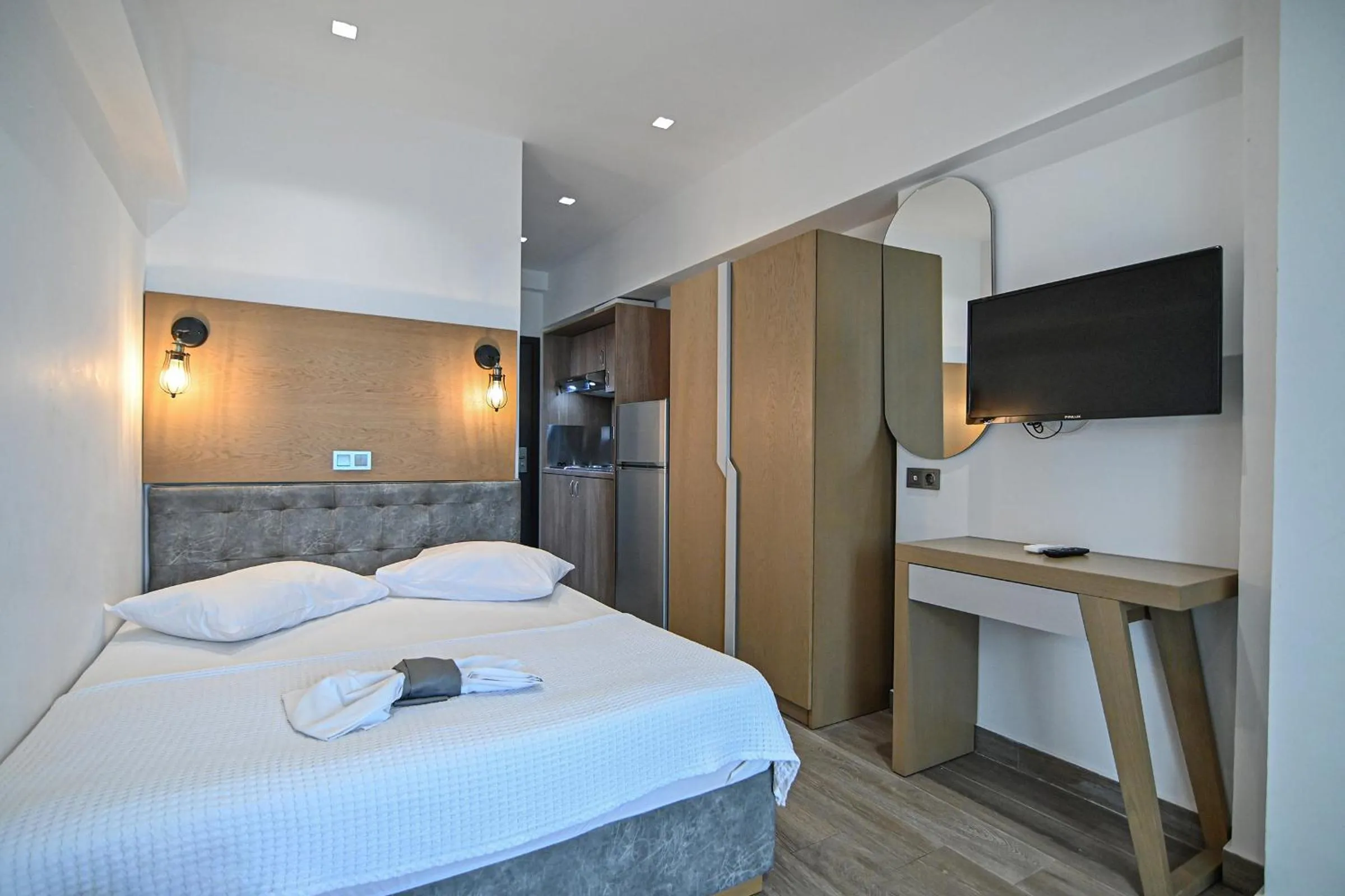 Bed in Amalia Rooms Sea View