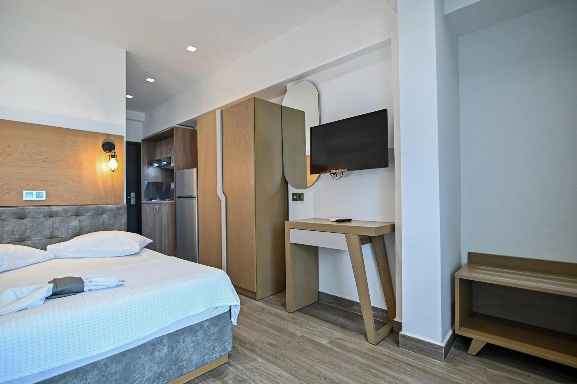 Bed in Amalia Rooms Sea View