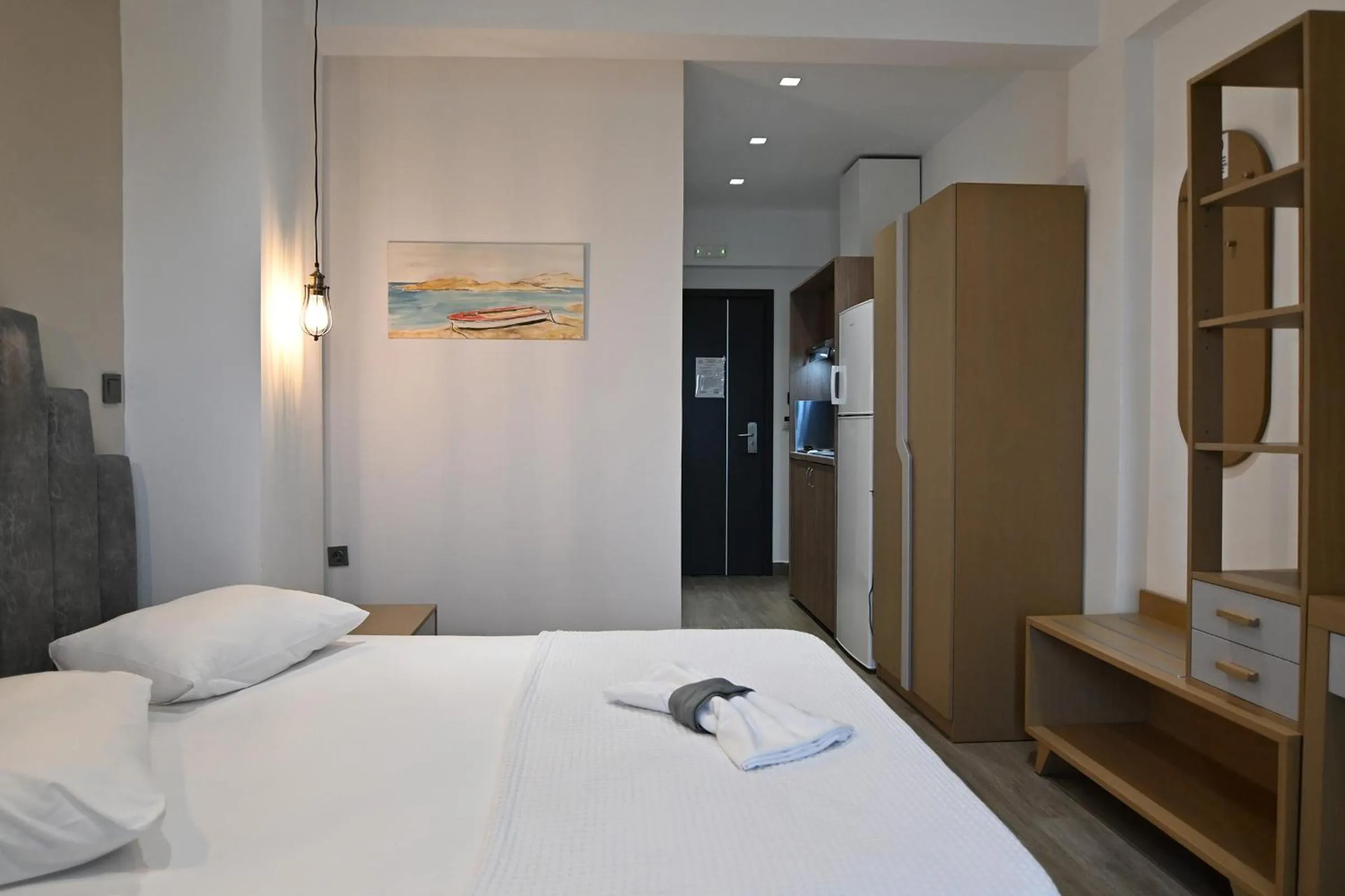 Bed in Amalia Rooms Sea View