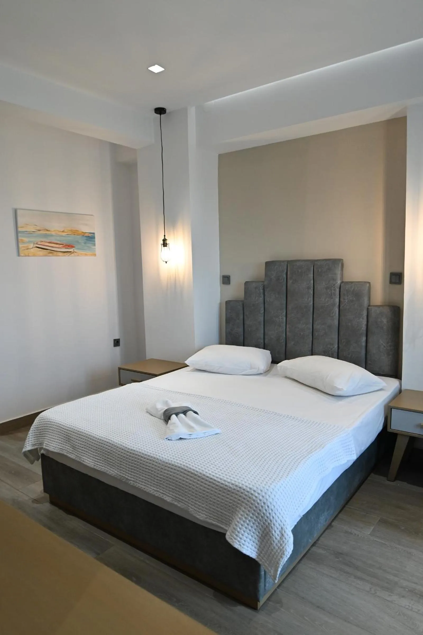 Bed in Amalia Rooms Sea View