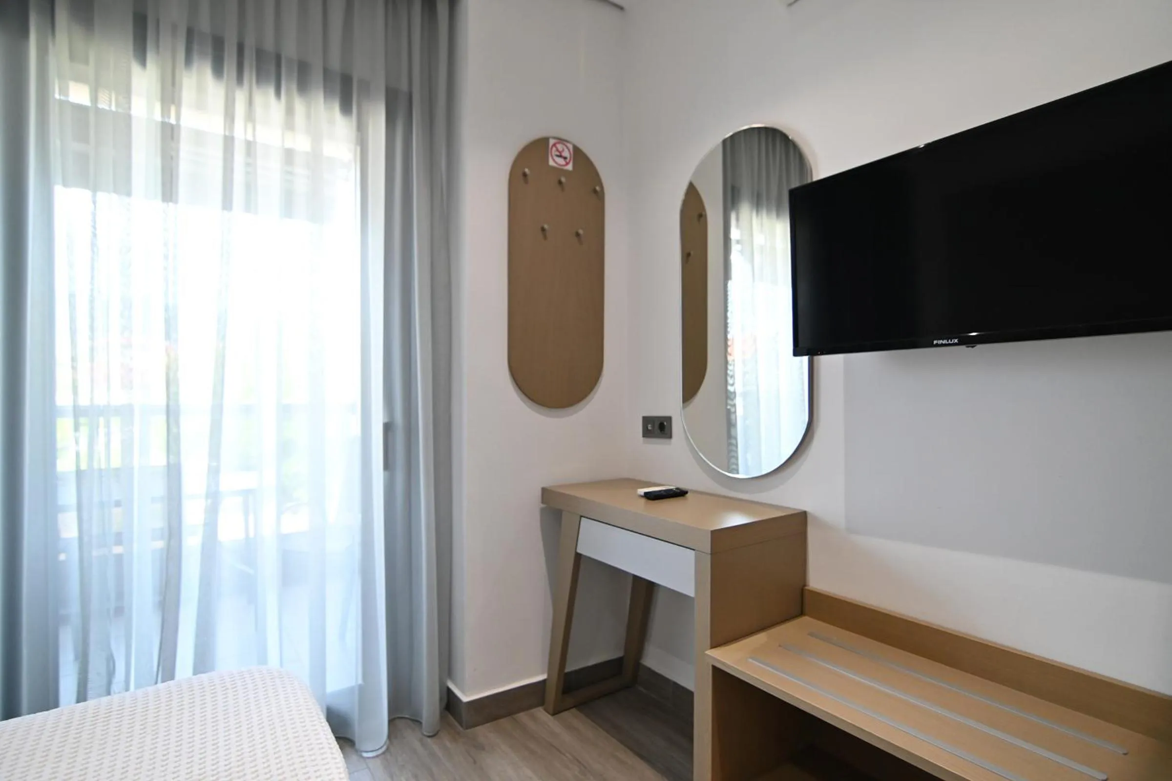 Bed in Amalia Rooms Sea View