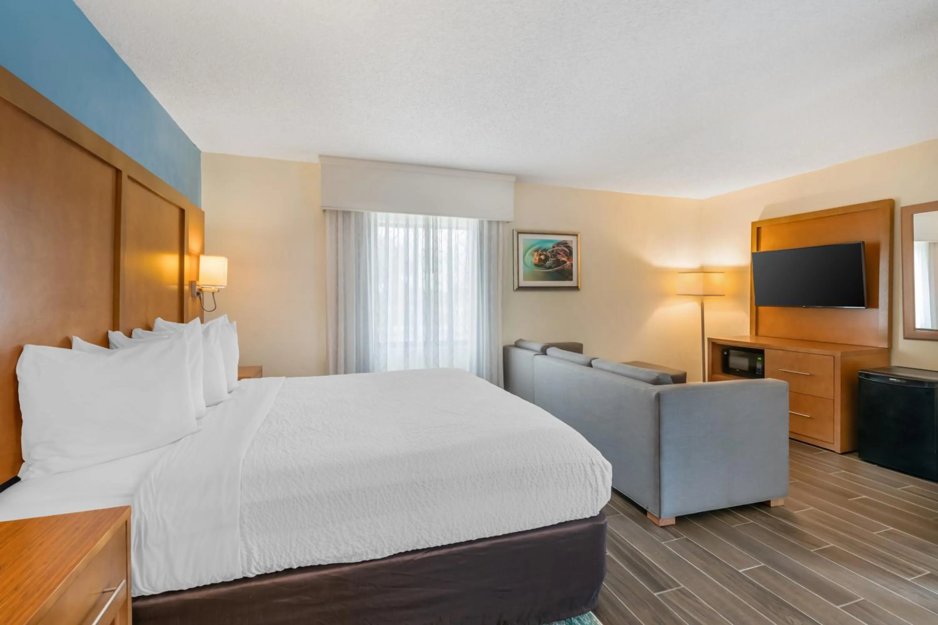 Photo of the whole room, Bed in Tropical Winds Resort Hotel