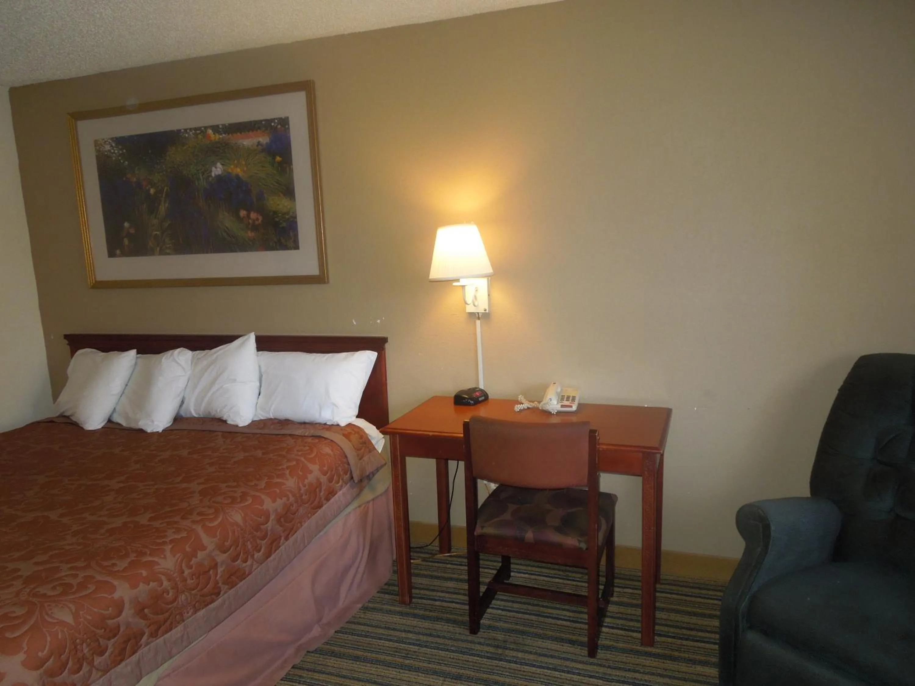 Bed in Super 8 by Wyndham Waldorf