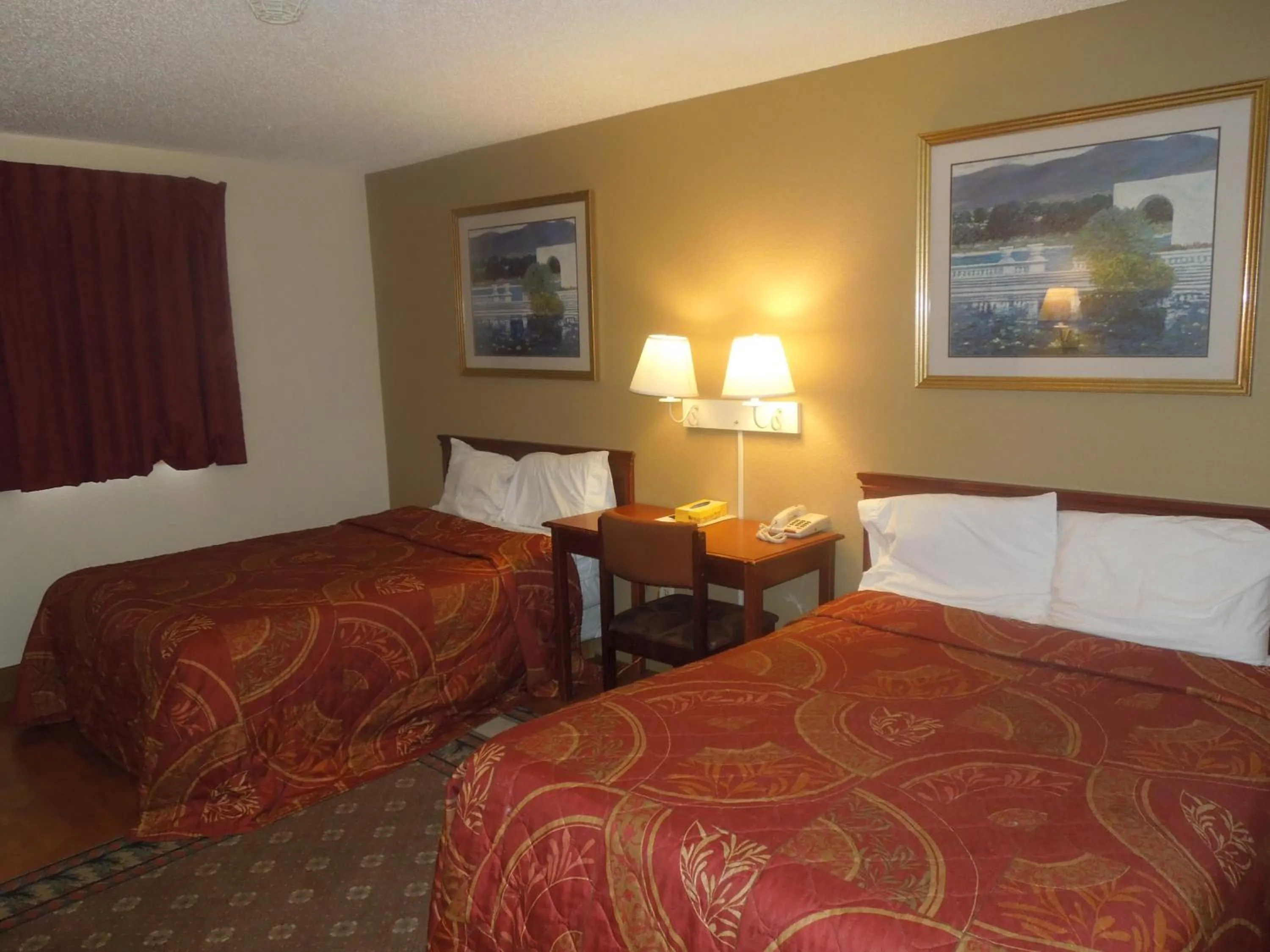 Bed in Super 8 by Wyndham Waldorf