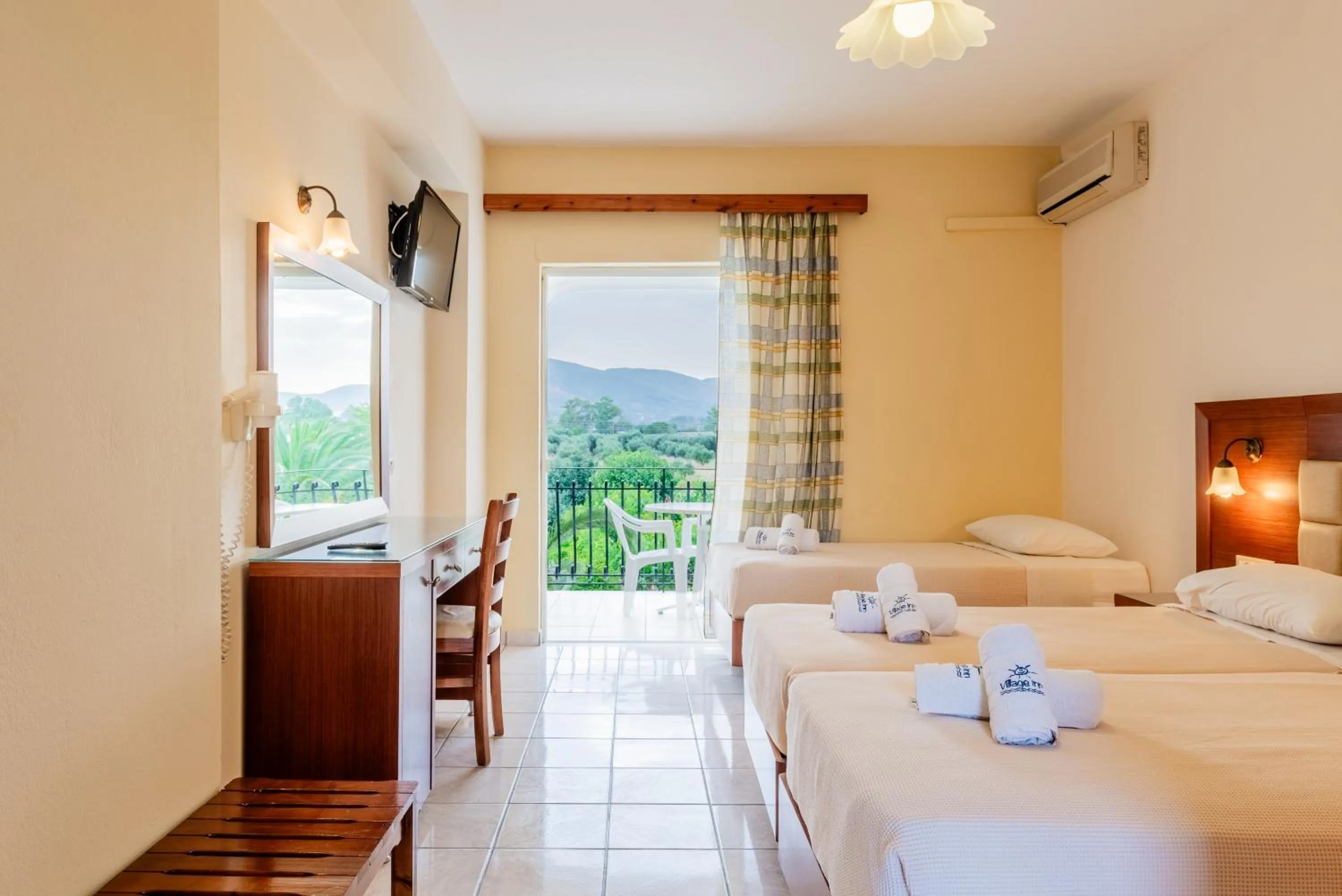 Photo of the whole room, Bed in Village Inn Studios & Family Apartments