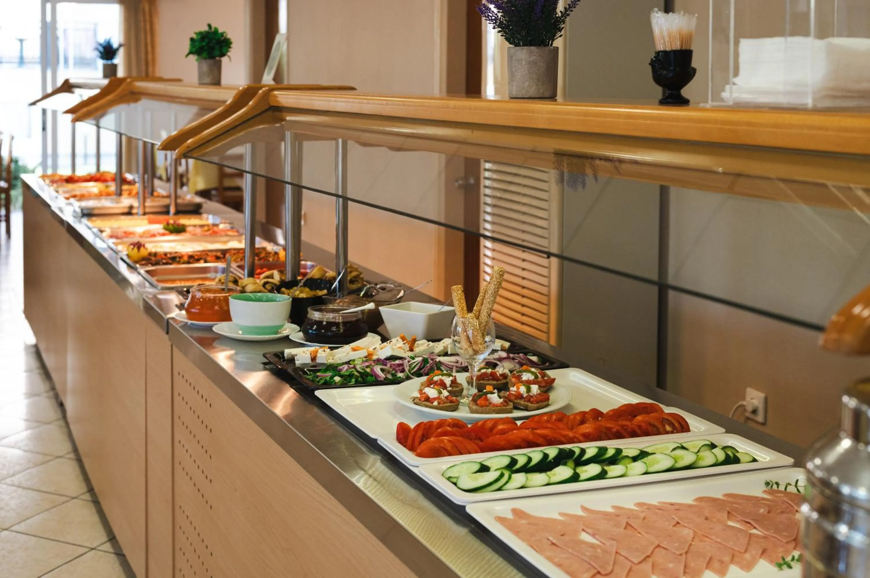 Buffet breakfast in Village Inn Studios & Family Apartments