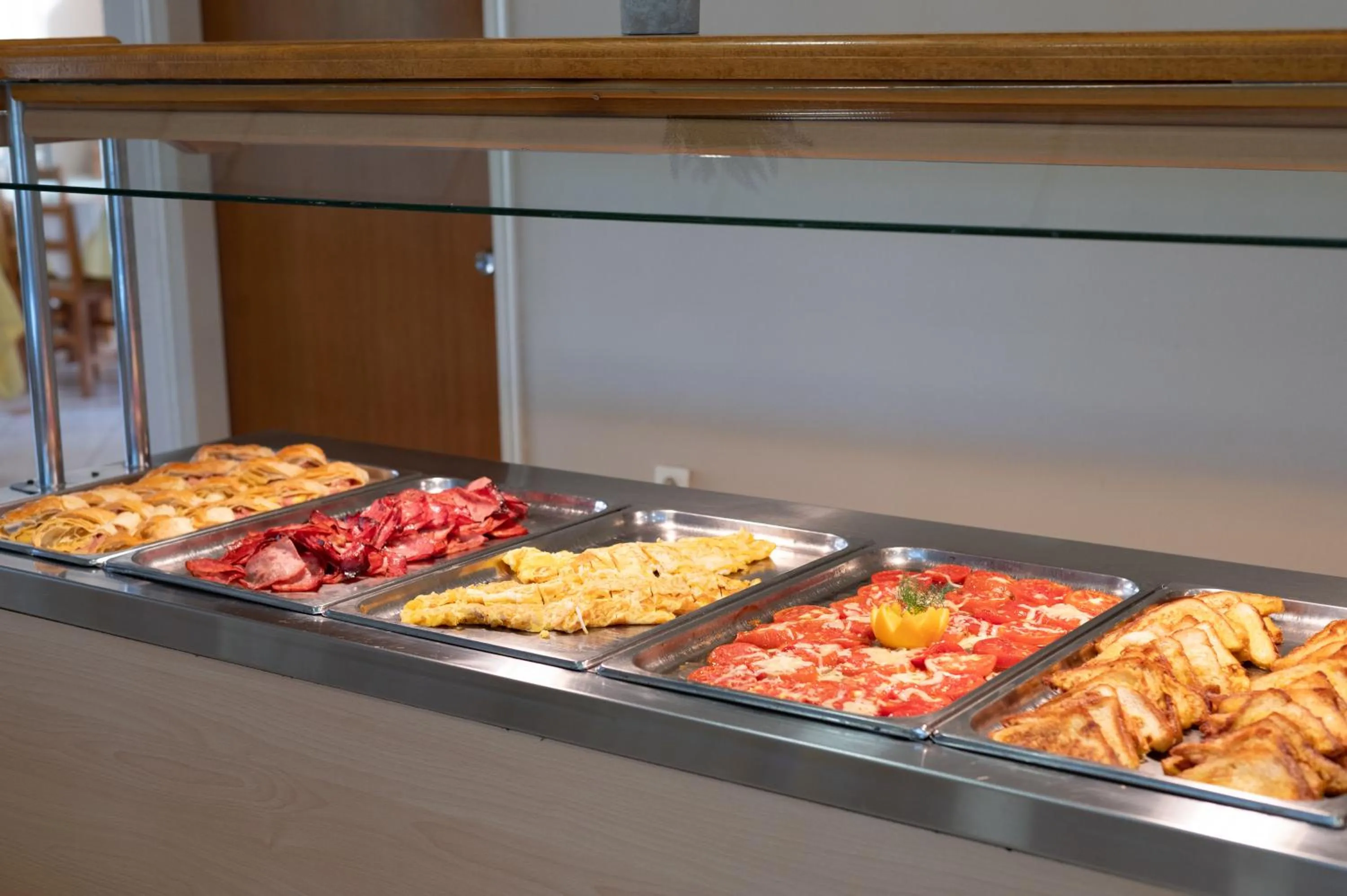 Buffet breakfast in Village Inn Studios & Family Apartments