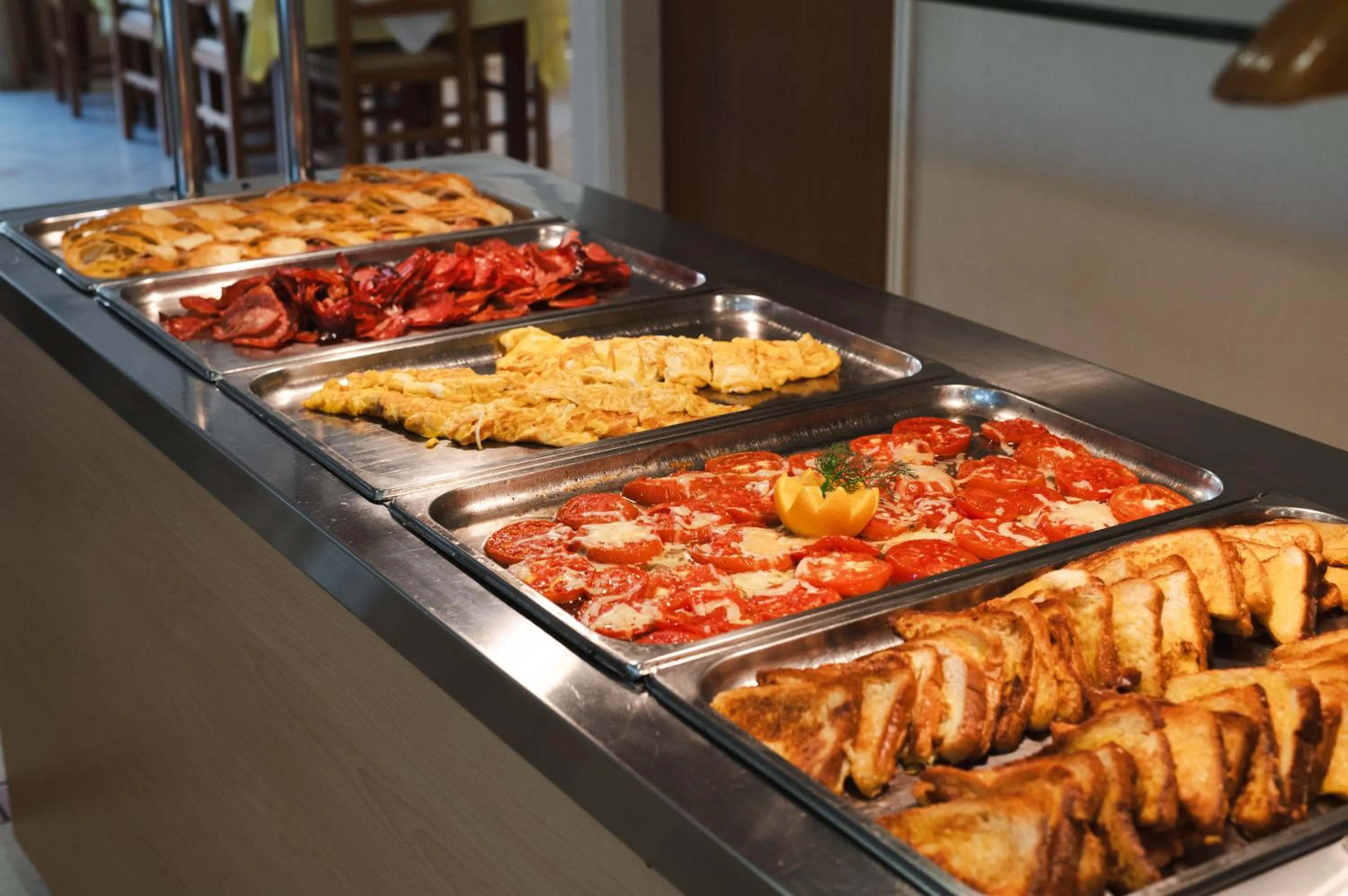 Buffet breakfast in Village Inn Studios & Family Apartments