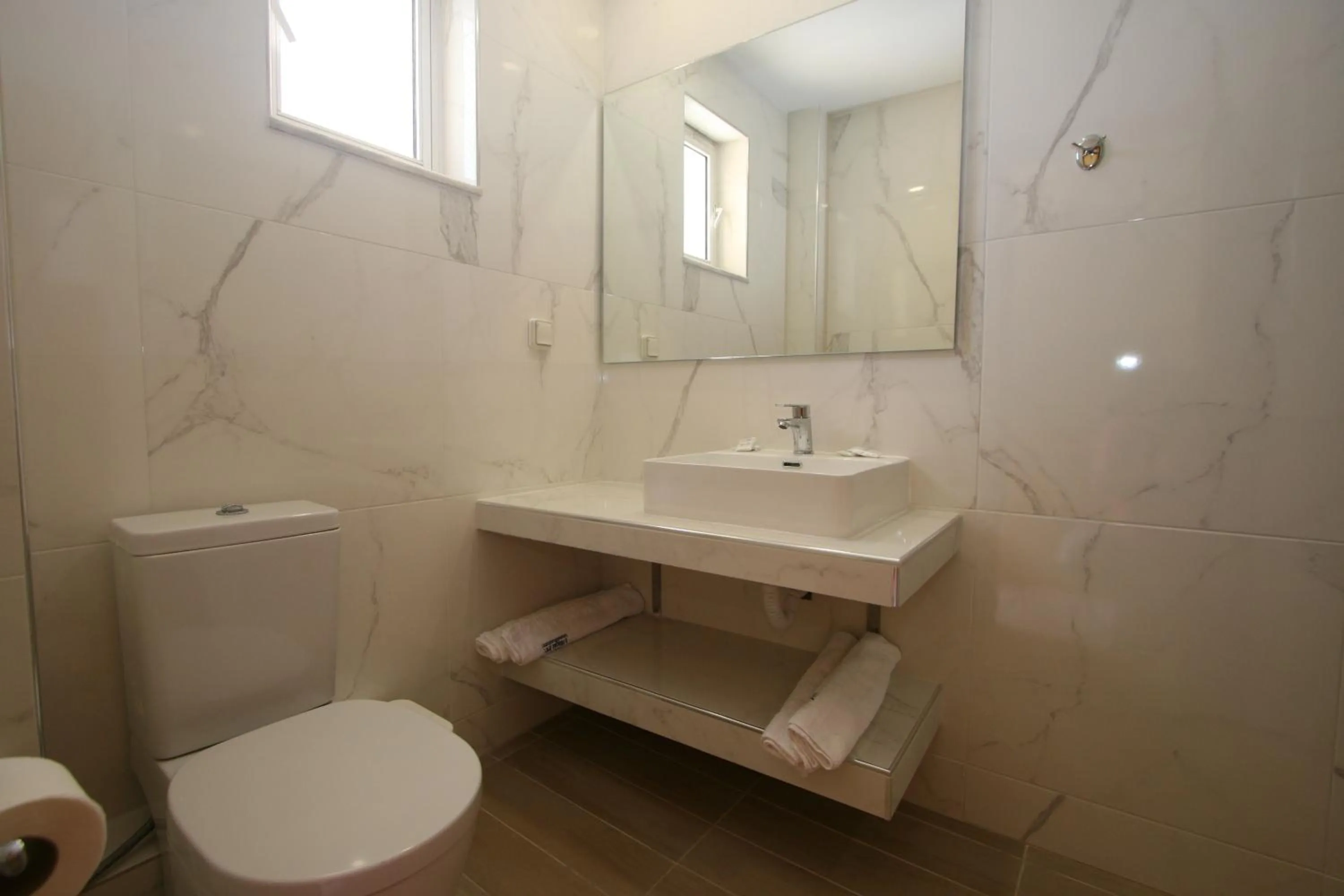 Bathroom in Village Inn Studios & Family Apartments