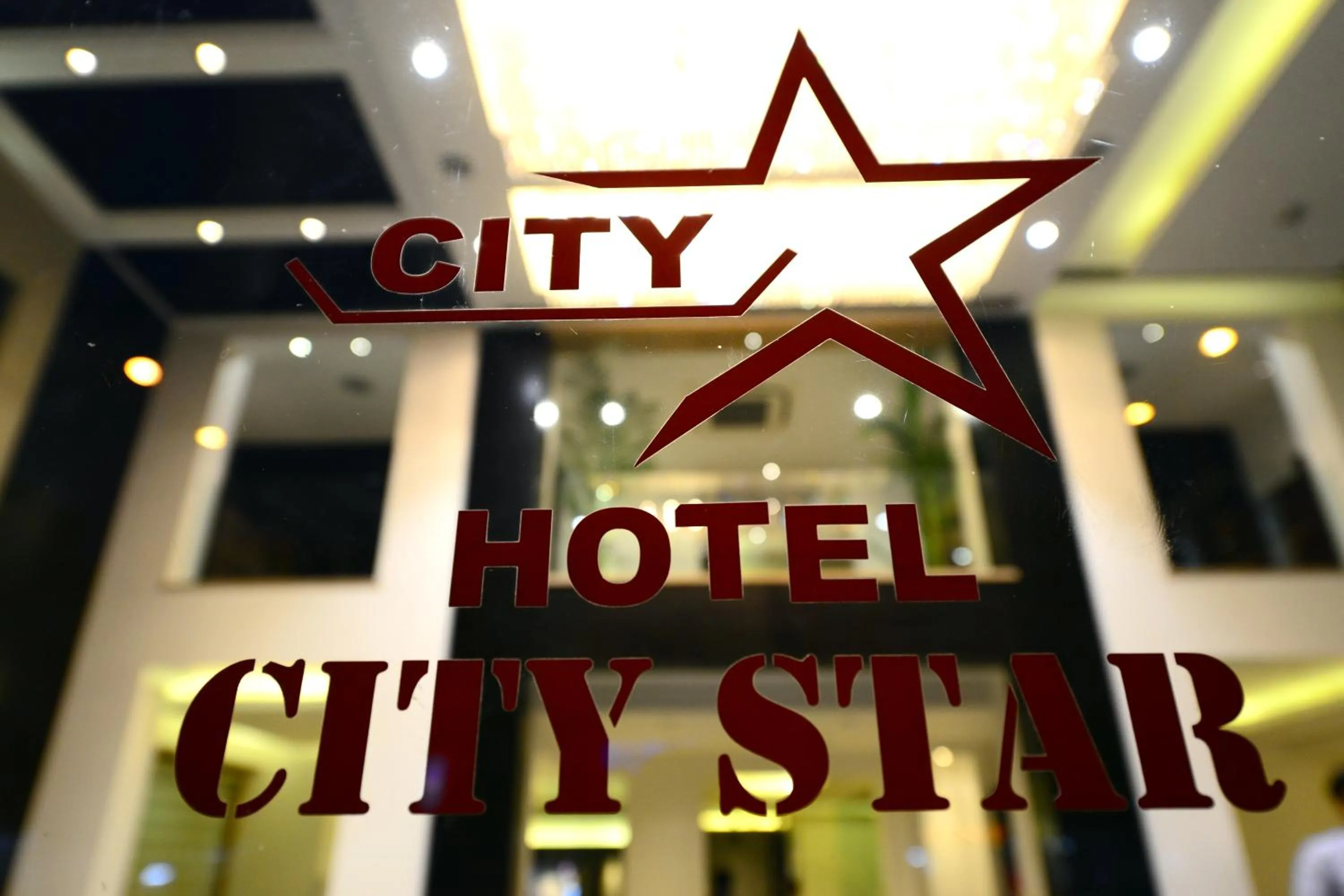 Property logo or sign in Hotel City Star - Free Airport Pickup