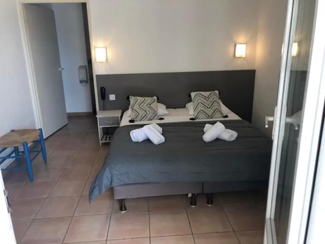 Bed in Hotel Le Bleu Marine