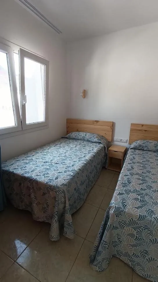 Bed in Apartamentos Boomerang I