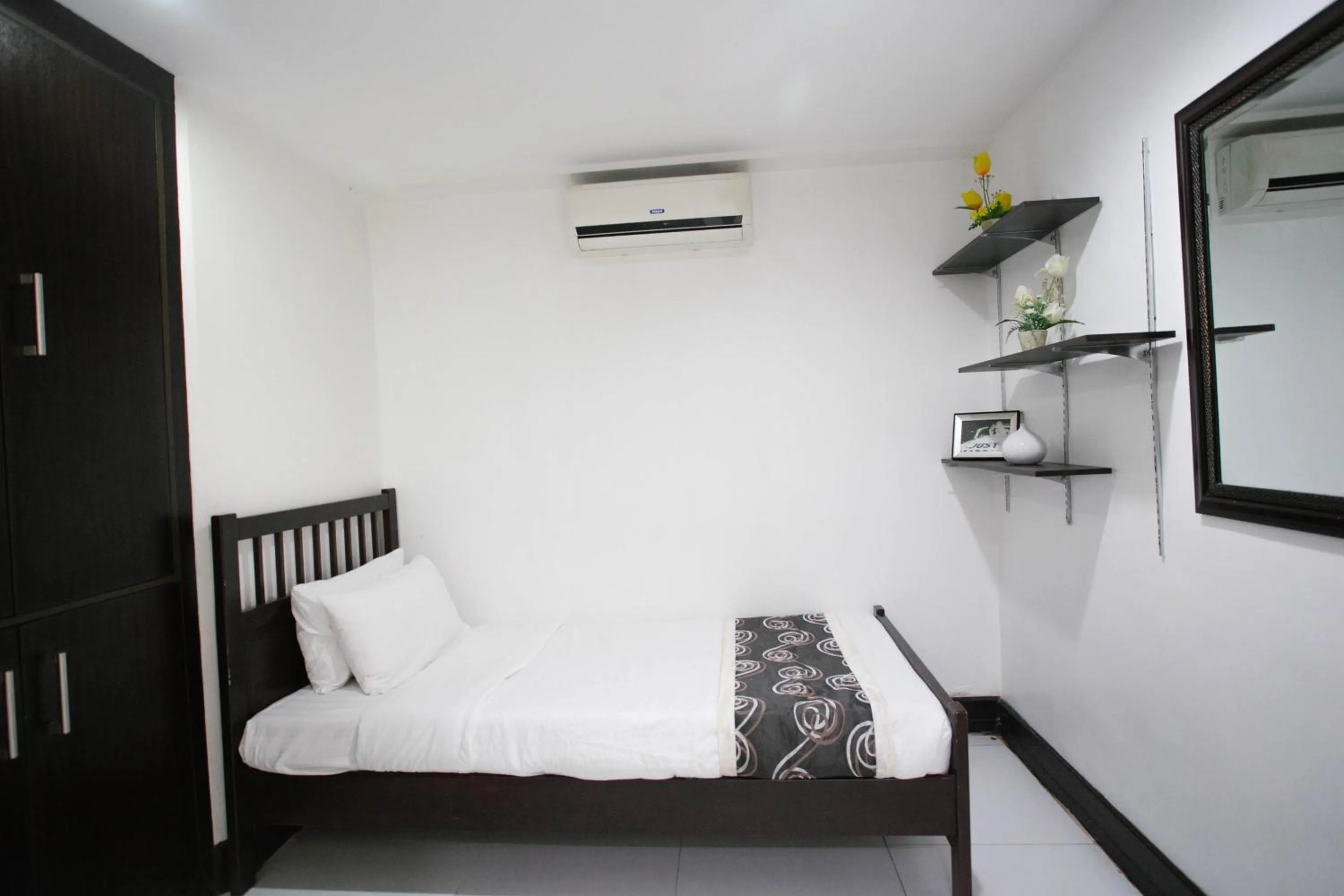 Bed in Diamond Suites and Residences