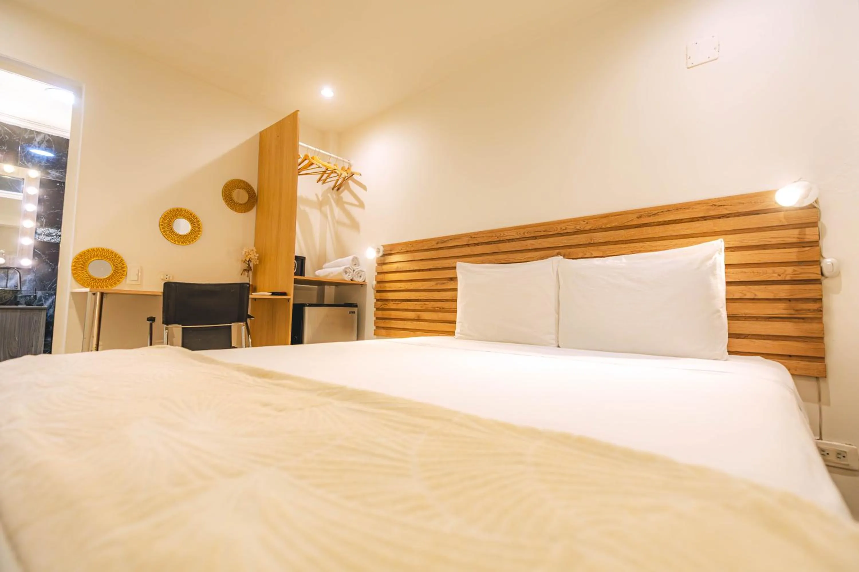 Bed in Ataraxy Hotel Boutique