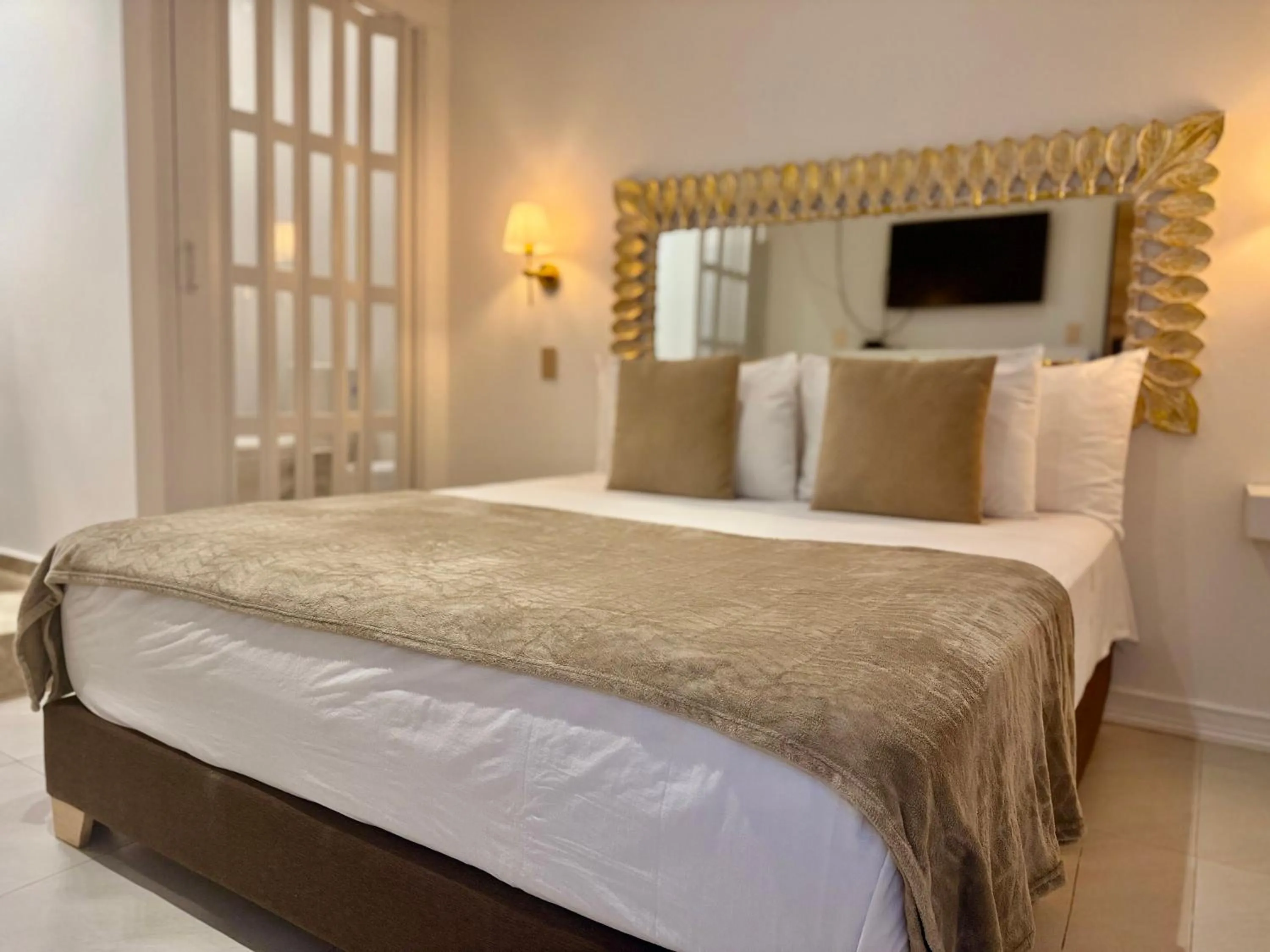 Bed in Ataraxy Hotel Boutique