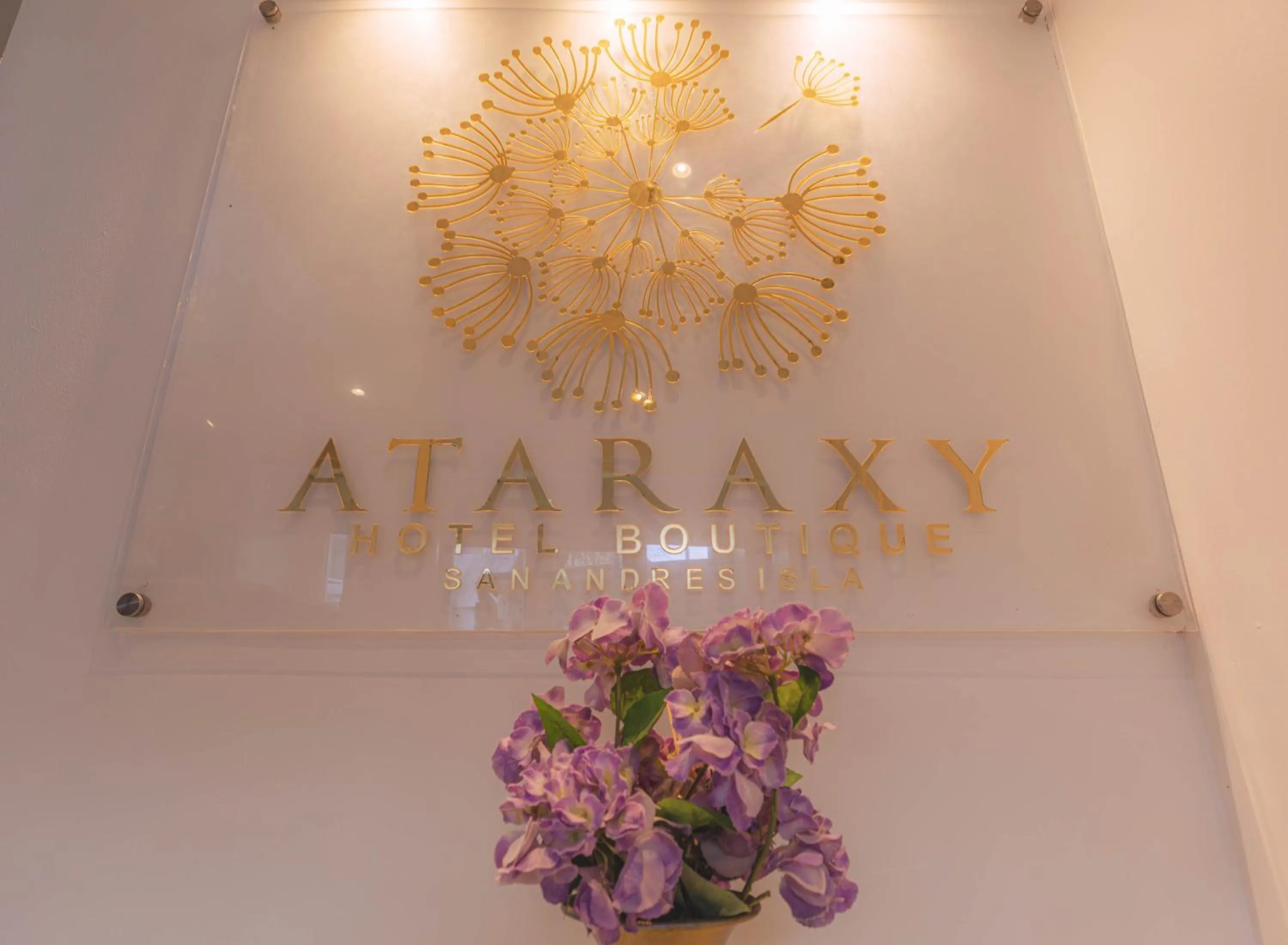 Logo/Certificate/Sign in Ataraxy Hotel Boutique