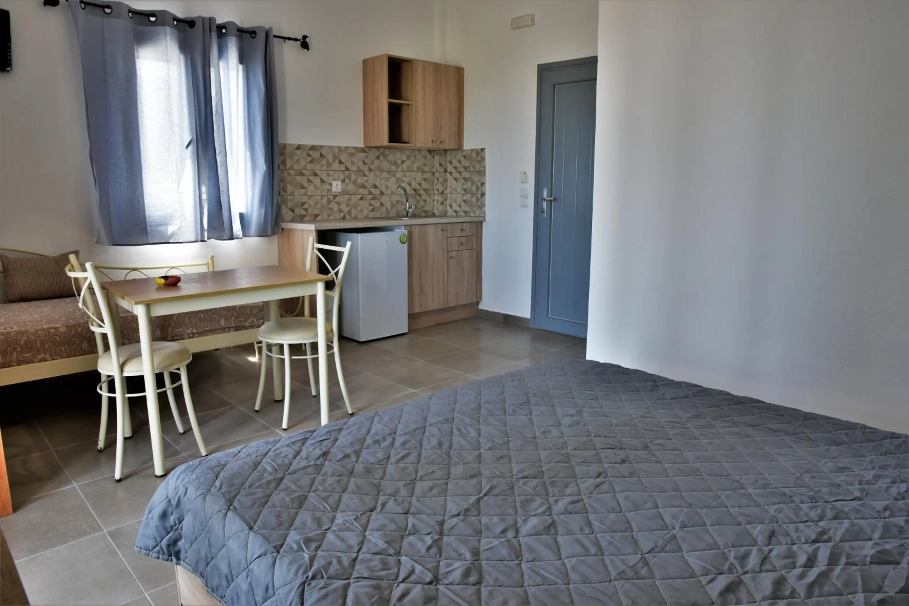 Bed in Kafouros Hotel