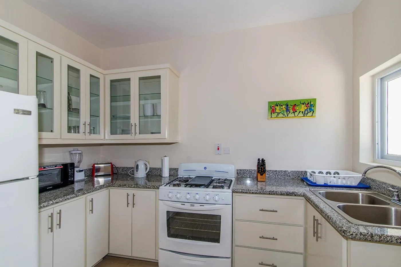 Kitchen or kitchenette in Family Complex beside Beach w/Pool Montego Bay #2