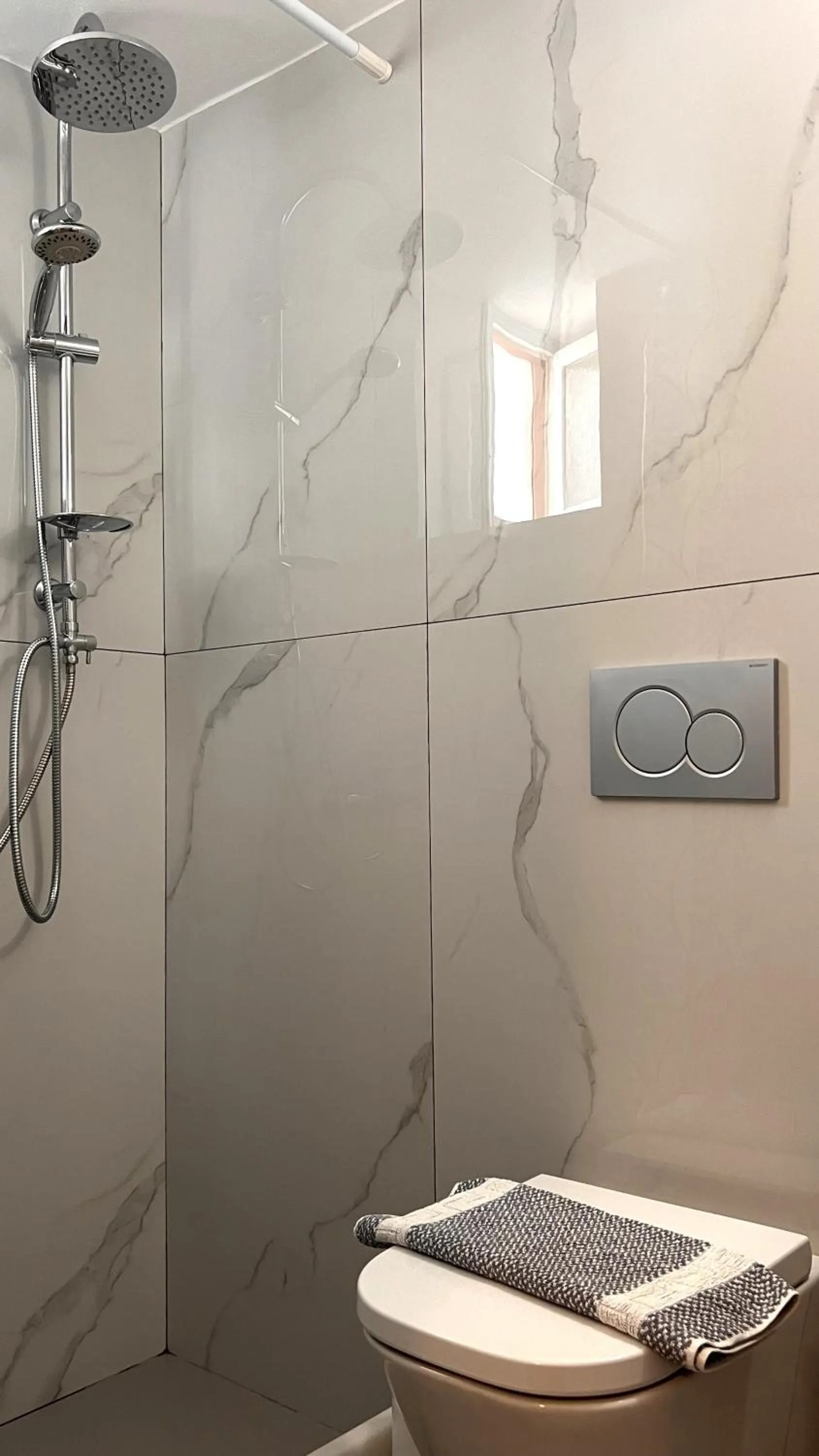 Bathroom in Marisa Rooms