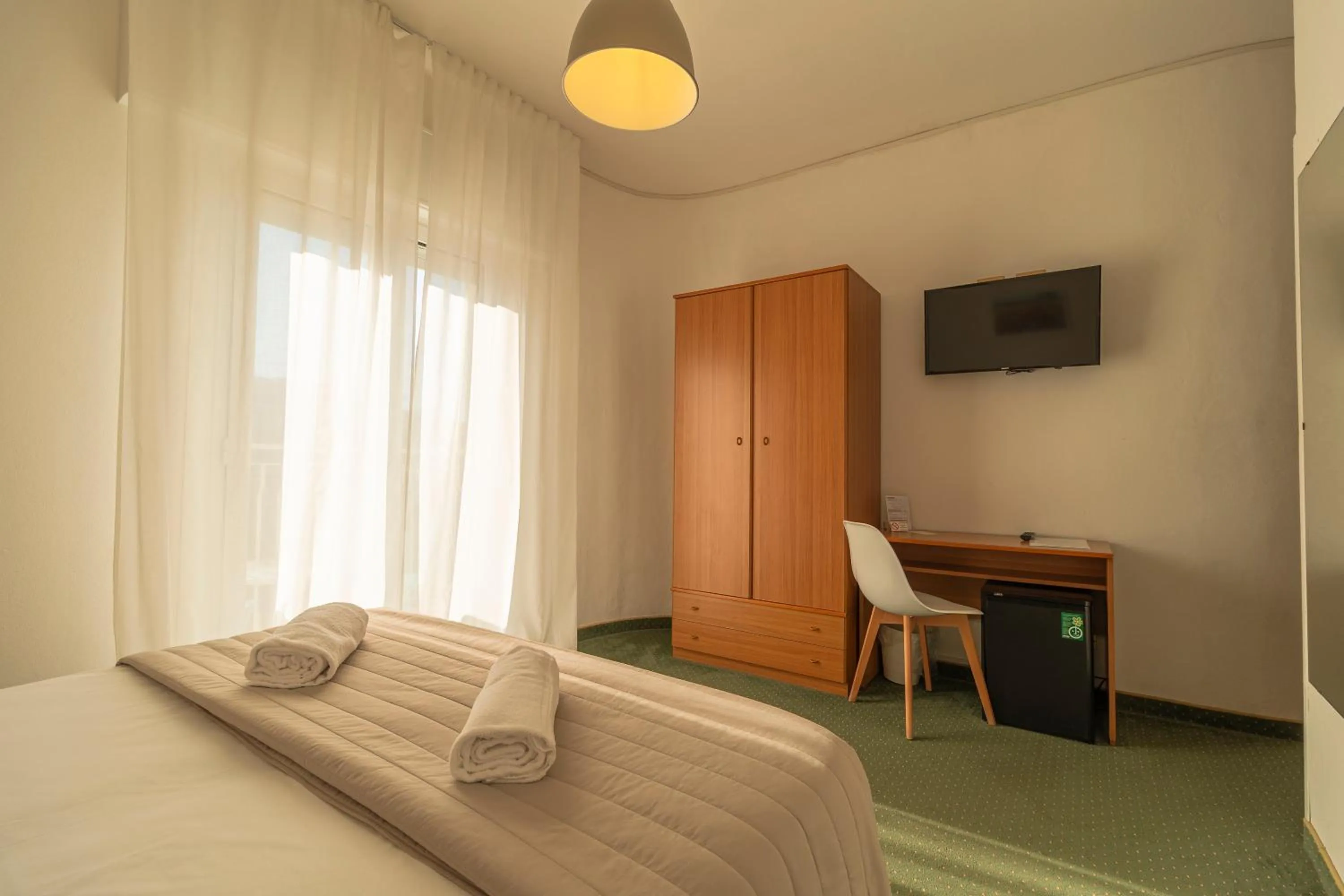 Bed in Hotel Concordia