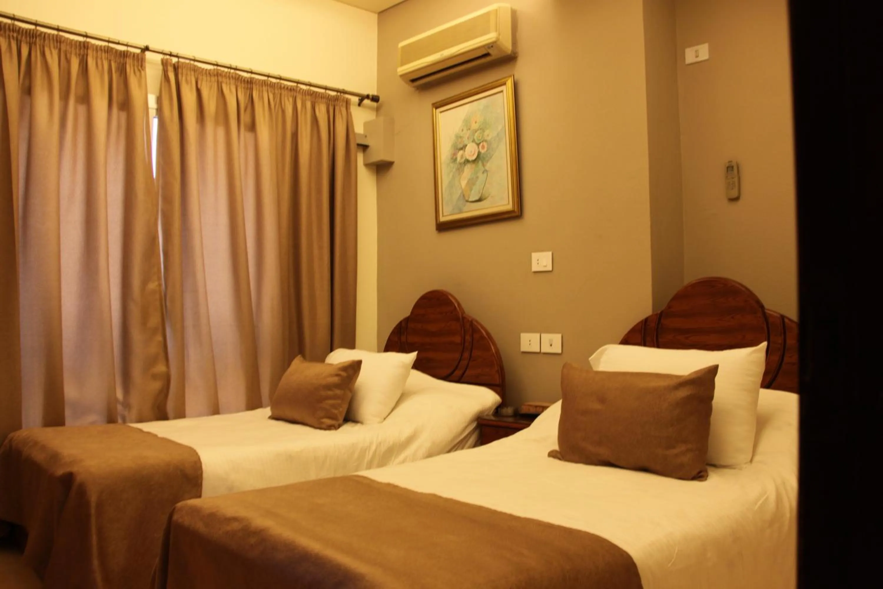 Bed in Lamedina Hotel & Resort