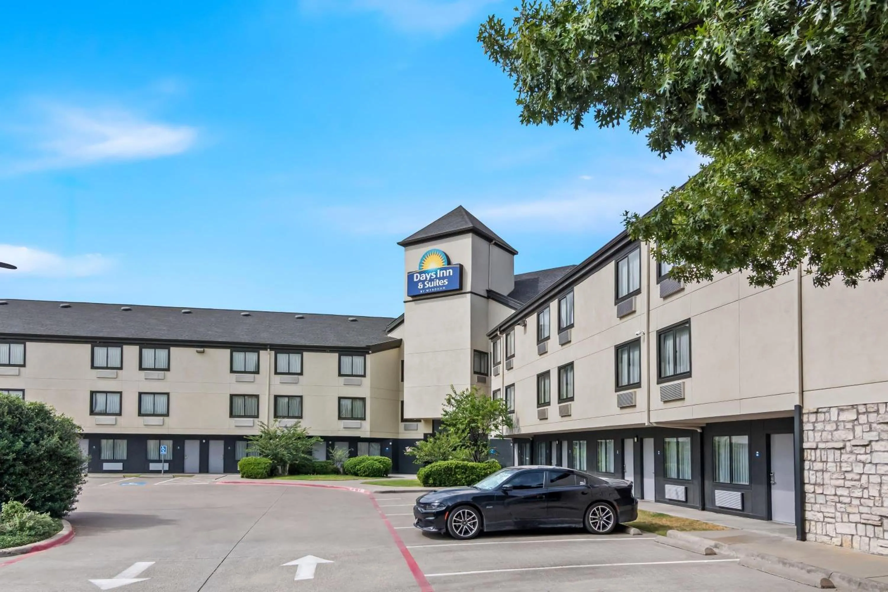 Swimming pool in Days Inn & Suites by Wyndham DeSoto