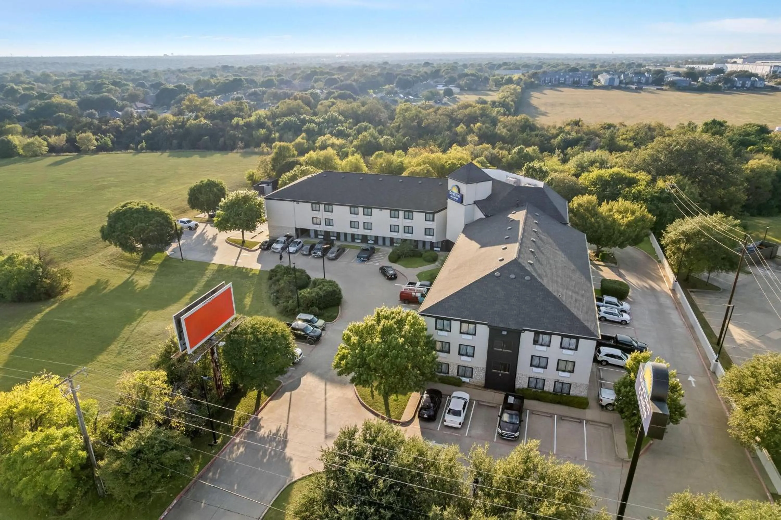 Property building in Days Inn & Suites by Wyndham DeSoto