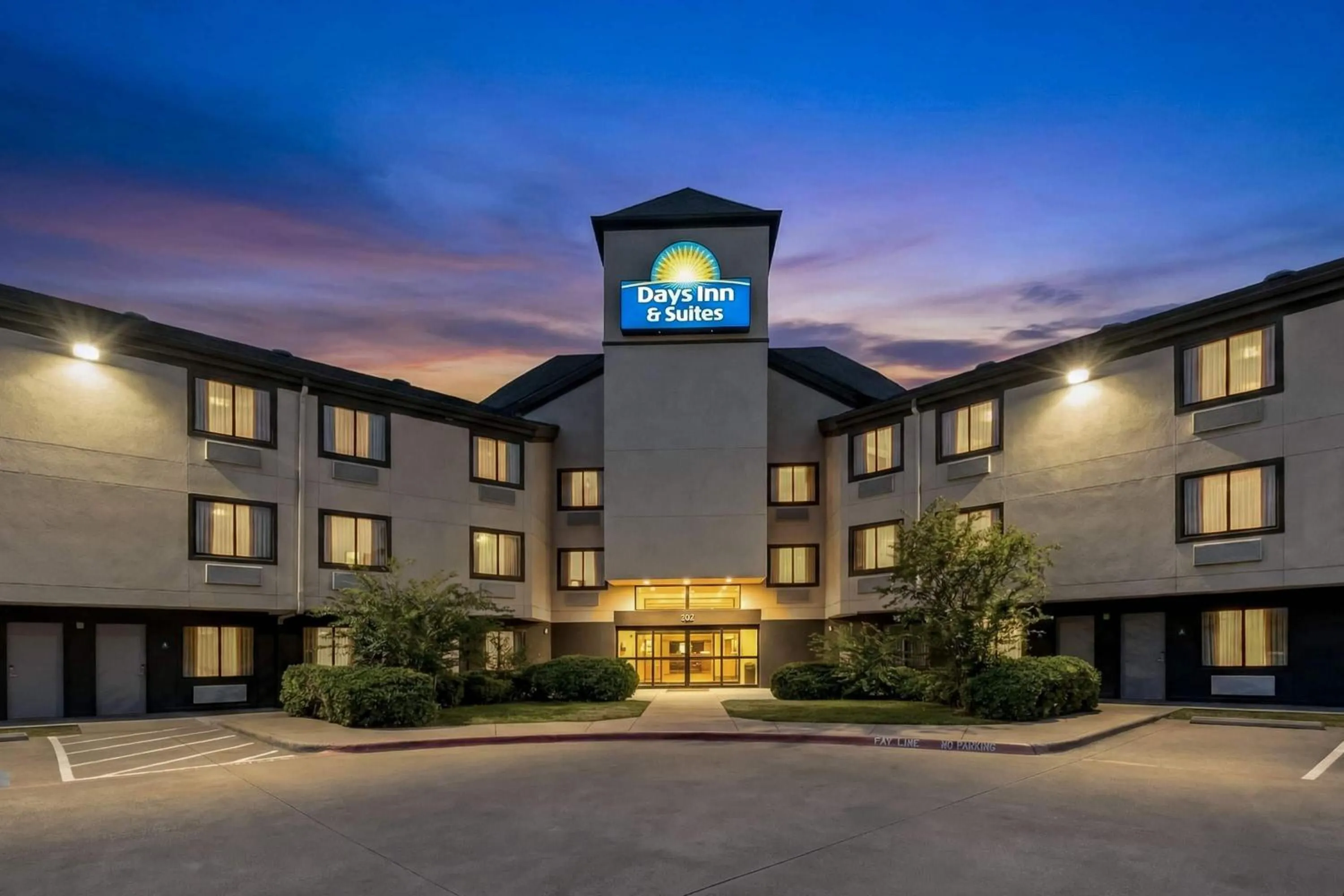 Property building in Days Inn & Suites by Wyndham DeSoto