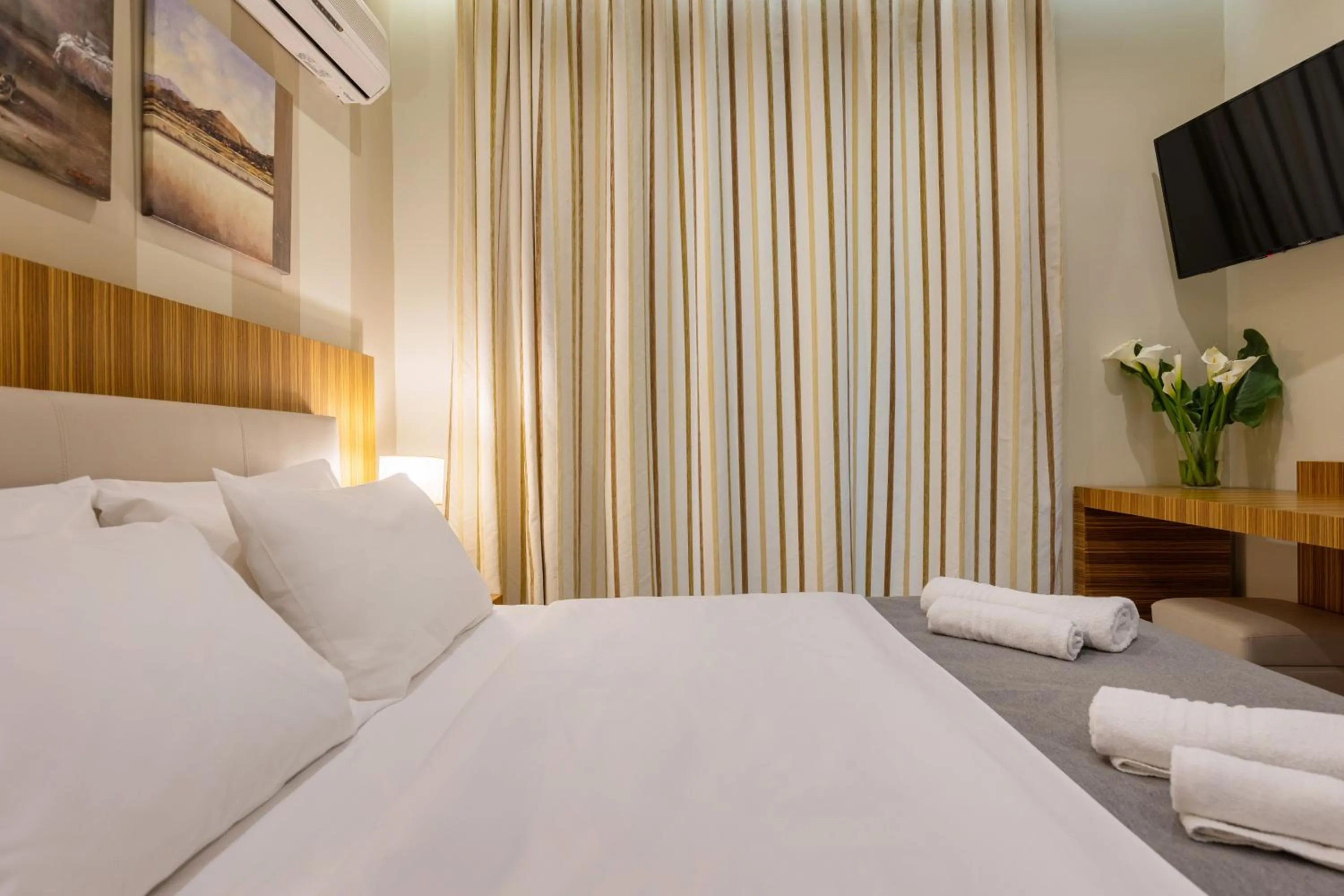 Bed in Agrilia Hotel Adults Only