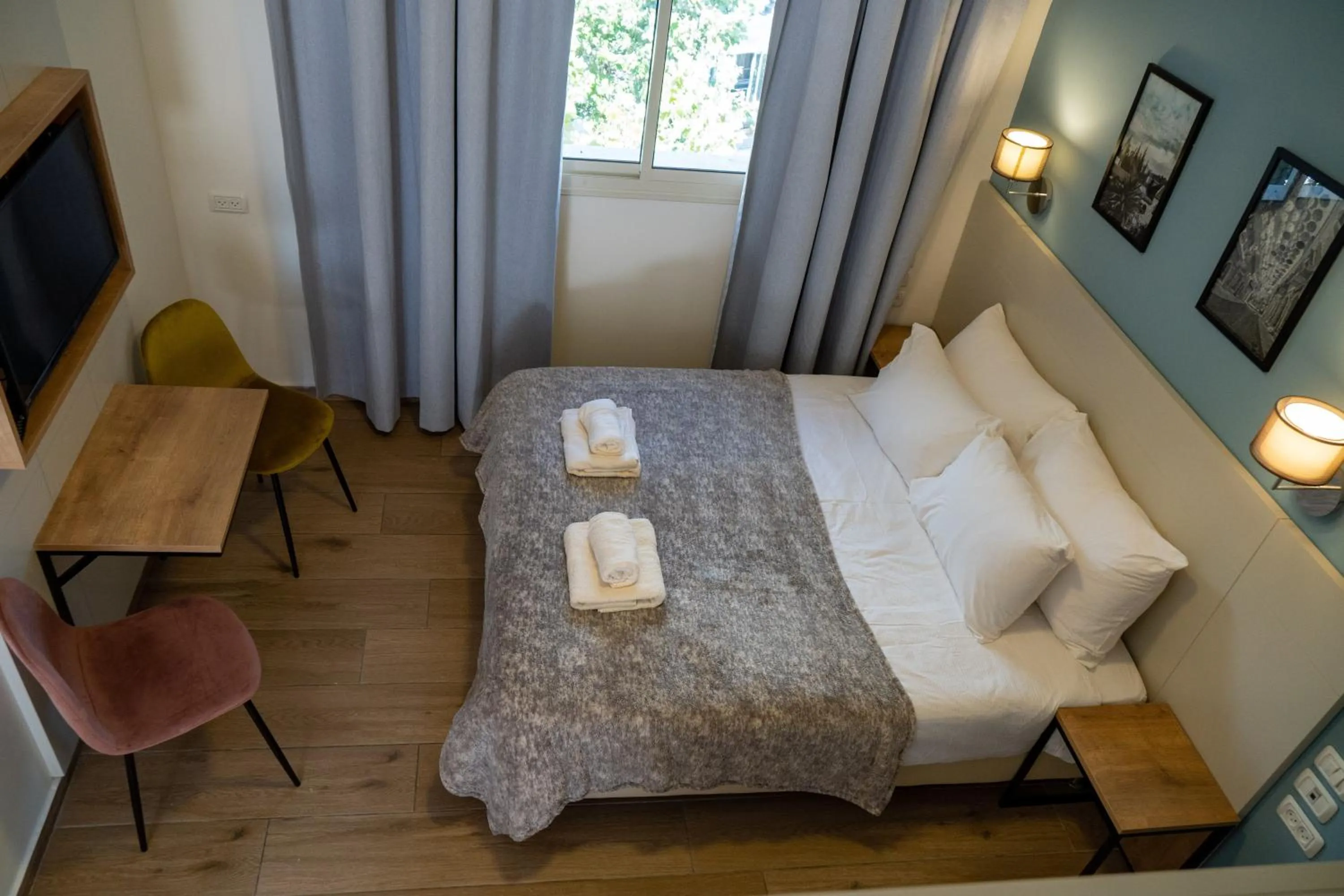 Bed in Shlomtzi Hotel